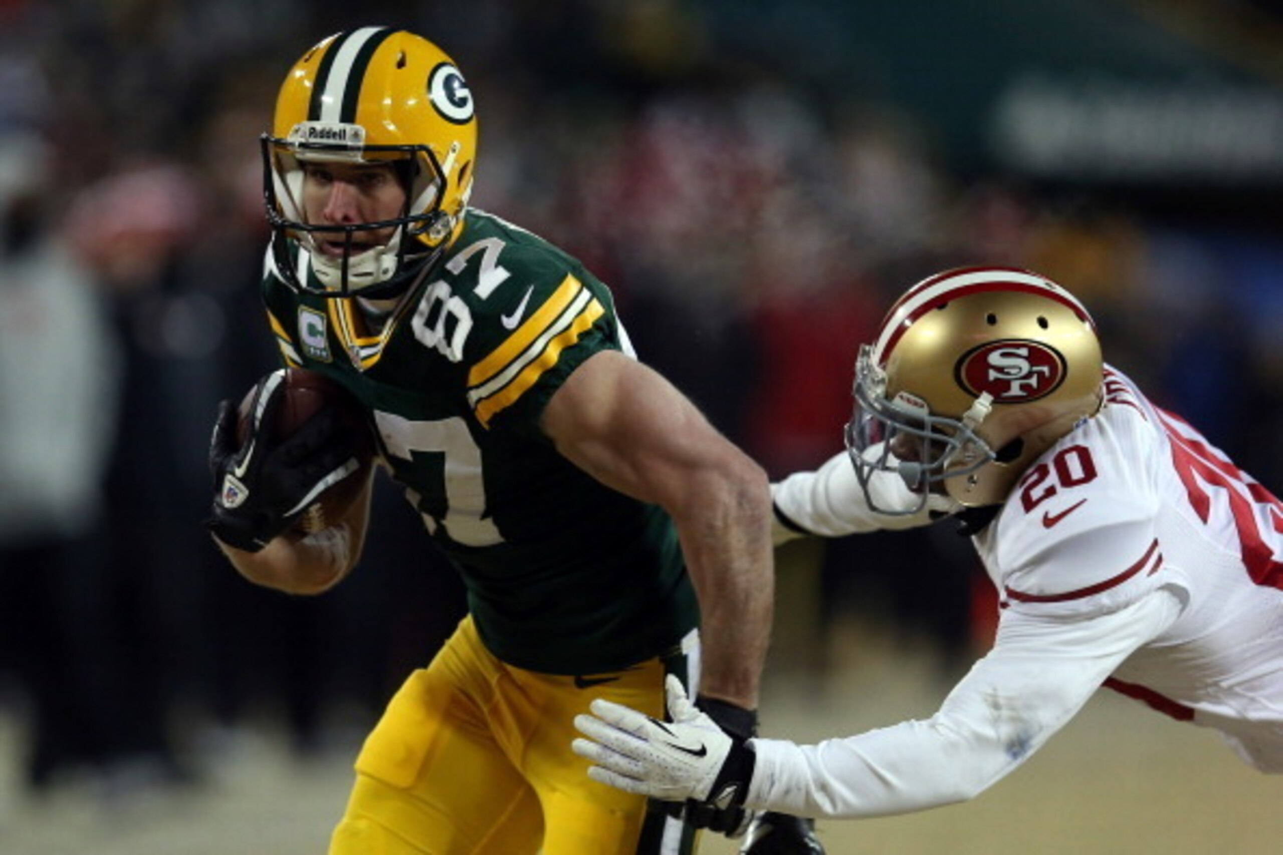 GREEN BAY, WI - JANUARY 05:  Jordy Nelson #87 of the Green Bay Packers runs against Perrish Cox #20 of the San Francisco 49ers during their NFC Wild Card Playoff game at Lambeau Field on January 5, 2014 in Green Bay, Wisconsin.  (Photo by Jonathan Daniel/