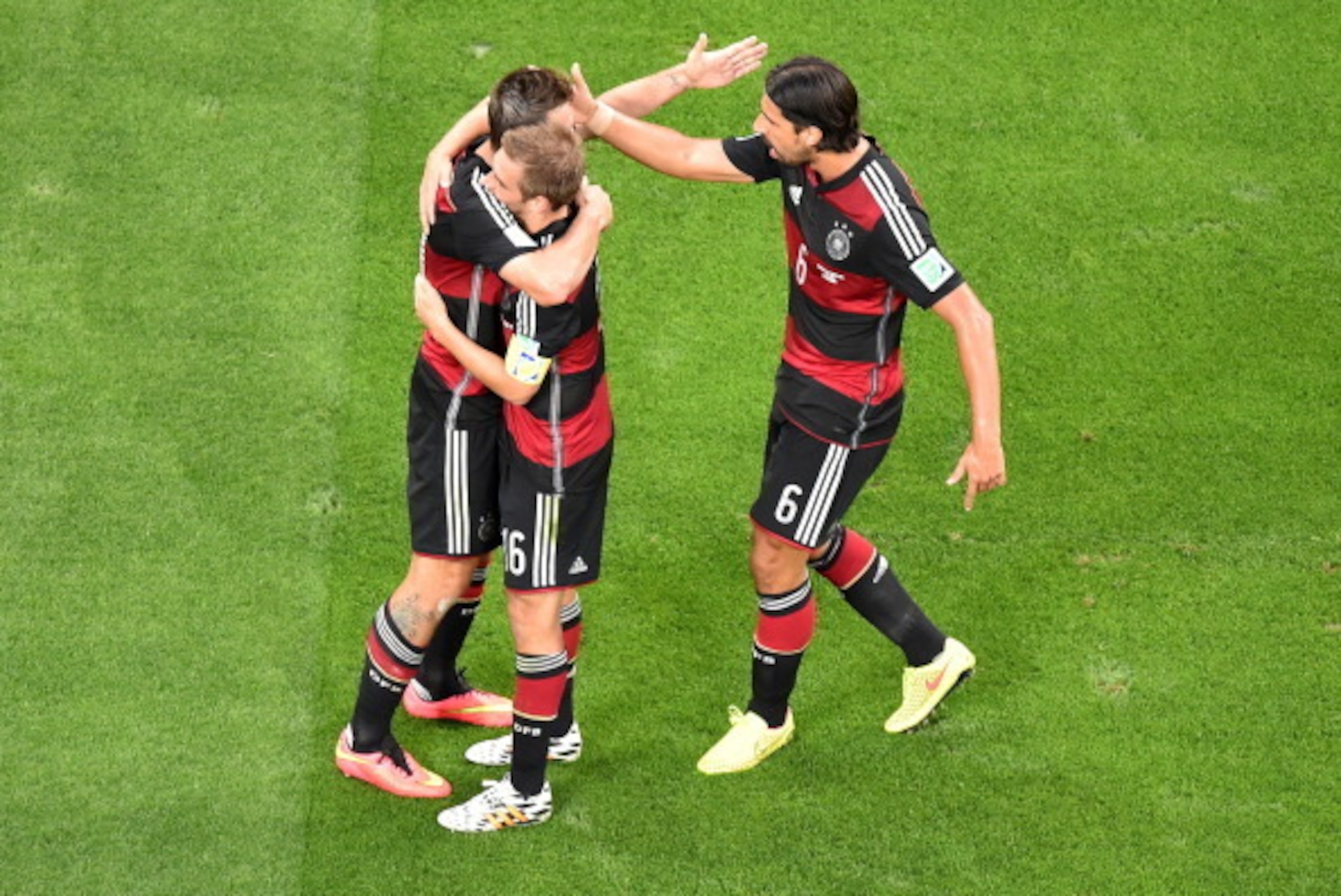 BELO HORIZONTE, BRAZIL - JULY 08: Miroslav Klose of Germany (L) celebrates scoring his team's second goal with Philipp Lahm (C) and Sami Khedira during the 2014 FIFA World Cup Brazil Semi Final match between Brazil and Germany at Estadio Mineirao on July BELO HORIZONTE, BRAZIL - JULY 08: Miroslav Klose of Germany (L) celebrates scoring his team's second goal with Philipp Lahm (C) and Sami Khedira during the 2014 FIFA World Cup Brazil Semi Final match between Brazil and Germany at Estadio Mineirao on July