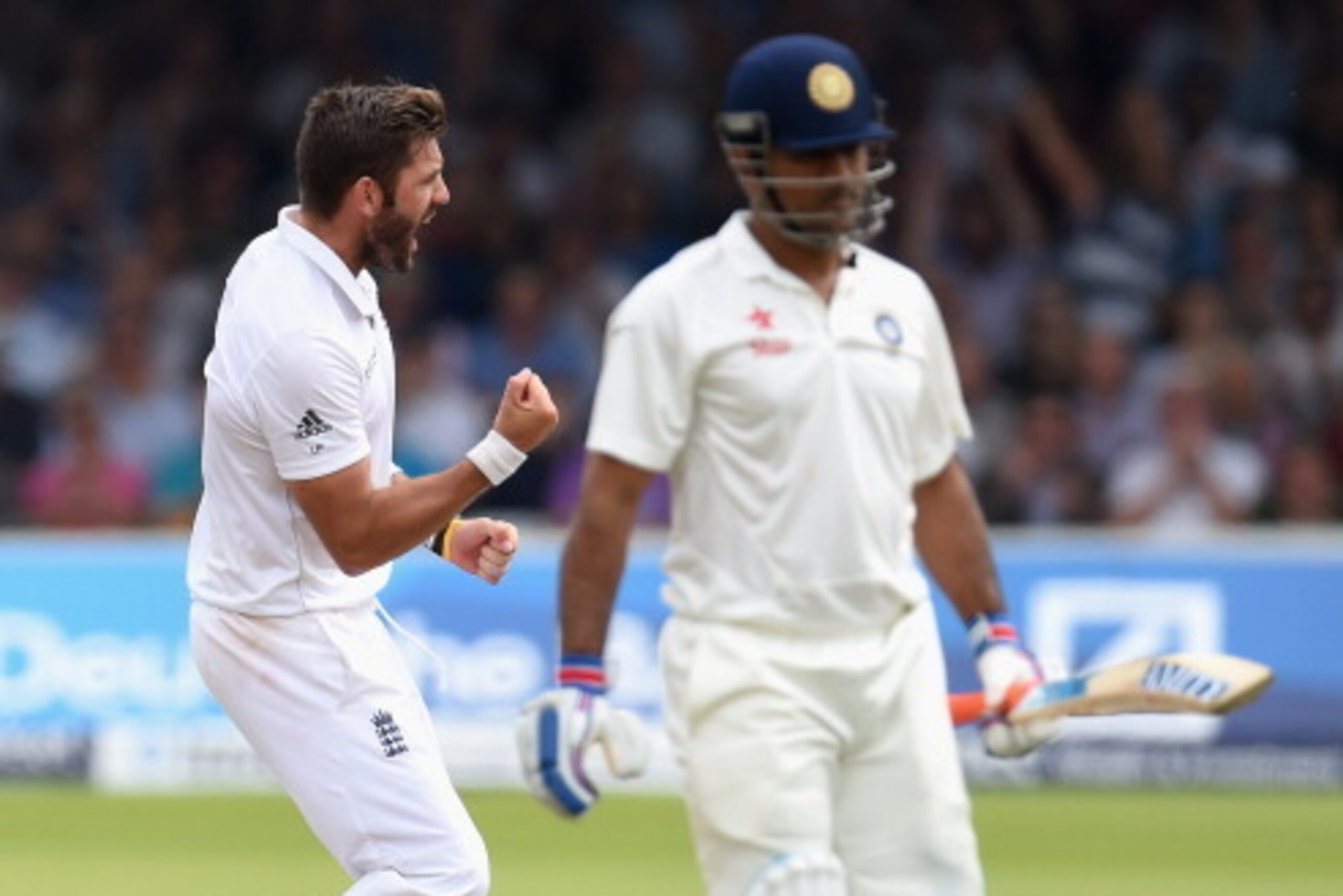 LONDON, ENGLAND - JULY 20:  England bowler Liam Plunkett celebrates after dismissing India batsman Mahendra Singh Dhoni during day four of 2nd Investec Test match between England and India at Lord's Cricket Ground on July 20, 2014 in London, United Kingdo