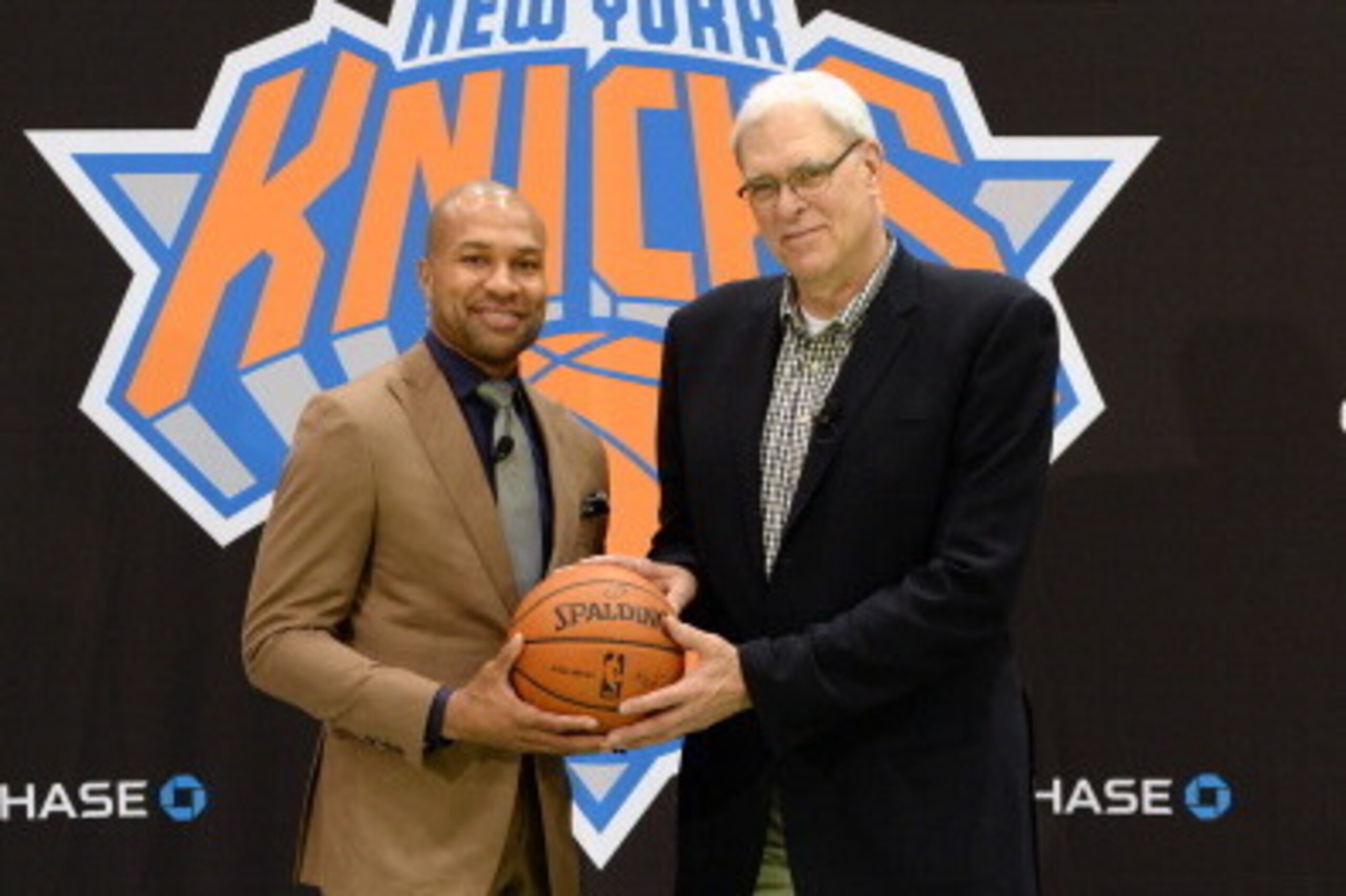 GREENBURGH, NY - JUNE 10:  (L-R) Derek Fisher and Phil Jackson pose for a photo during the announcement of Derek Fisher as head coach of the New York Knicks at a press conference on June 10, 2014 in Greenburgh, New York. NOTE TO USER: User expressly ackno