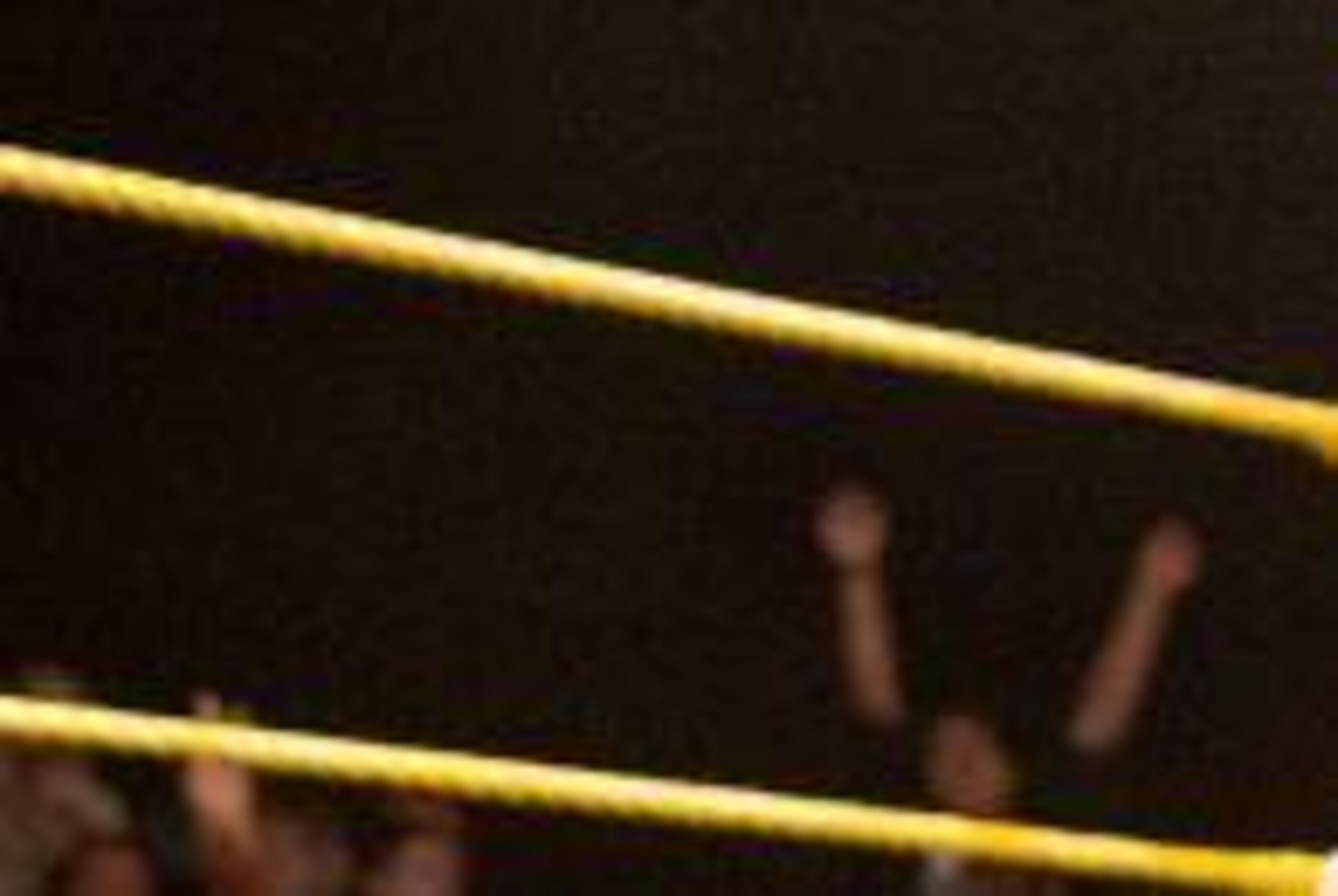 Kalisto pins Simon Gotch.