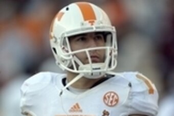 Oct 26, 2013; Tuscaloosa, AL, USA; Tennessee Volunteers quarterback Justin Worley (14) looks on from the sidelines after being taken out of the game against the Alabama Crimson Tide at Bryant-Denny Stadium. Mandatory Credit: John David Mercer-USA TODAY Sp