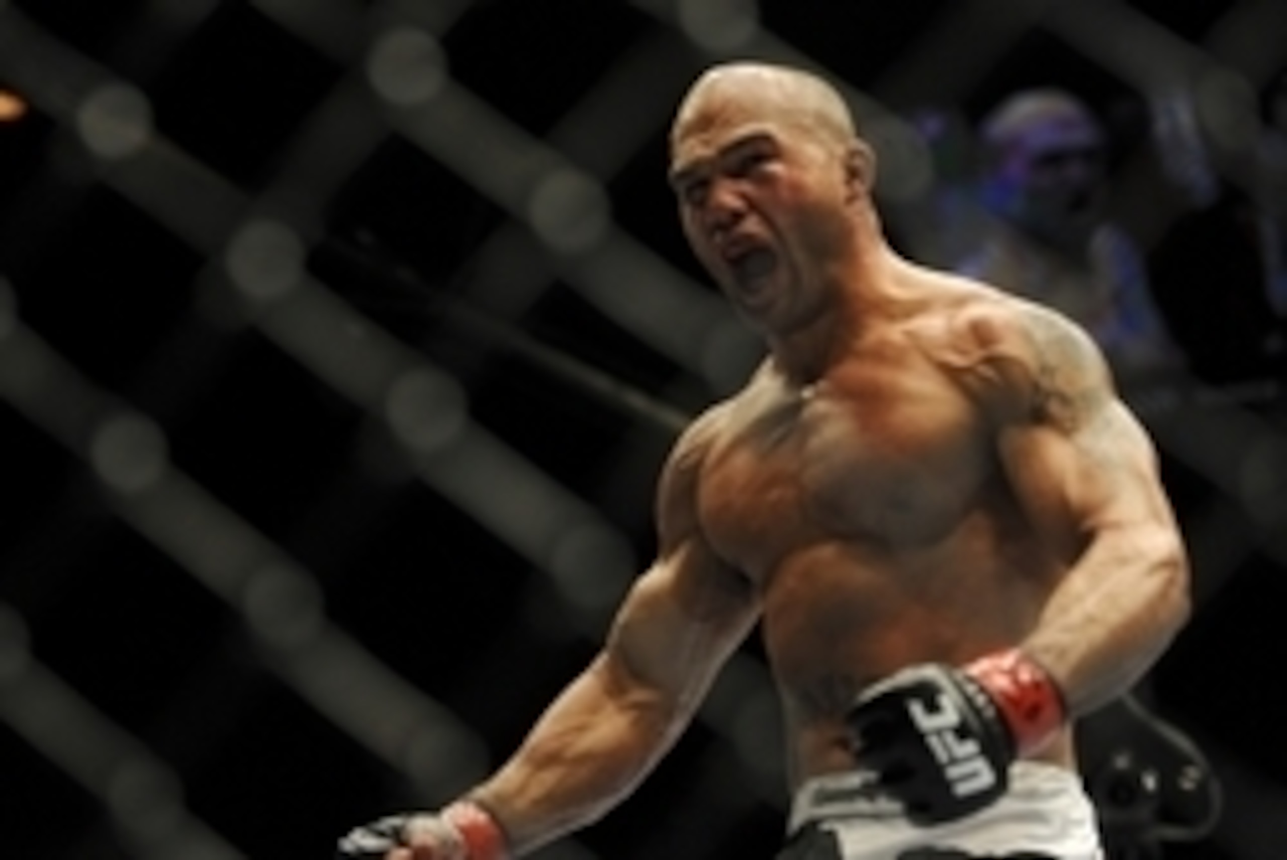 May 24, 2014; Las Vegas, NV, USA; Robbie Lawler (red) screams after finishing his UFC 173 light heavyweight bout against opponent Jake Ellenberger (blue) at MGM Grand Garden Arena. Lawler won his bout by way of TKO. Mandatory Credit: Stephen R. Sylvanie-U