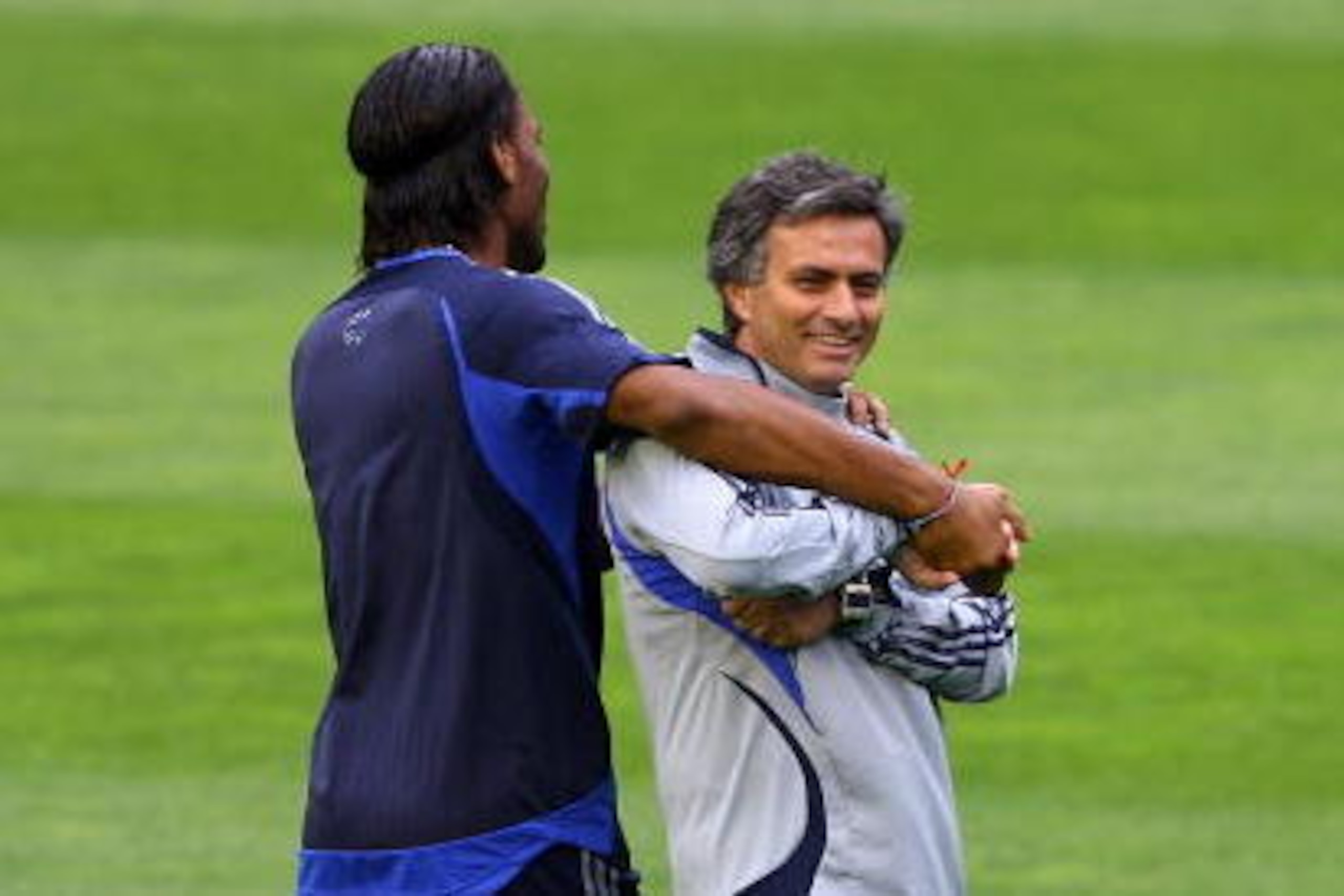 VALENCIA, SPAIN - APRIL 09:  Chelsea Coach Jose Mourinho (R) shares a joke with striker Didier Drogba during Chelsea training and press conference today ahead of tomorrows Champions League Quarter Final Second Leg at the Stadium Mestalla on April 9, 2007 