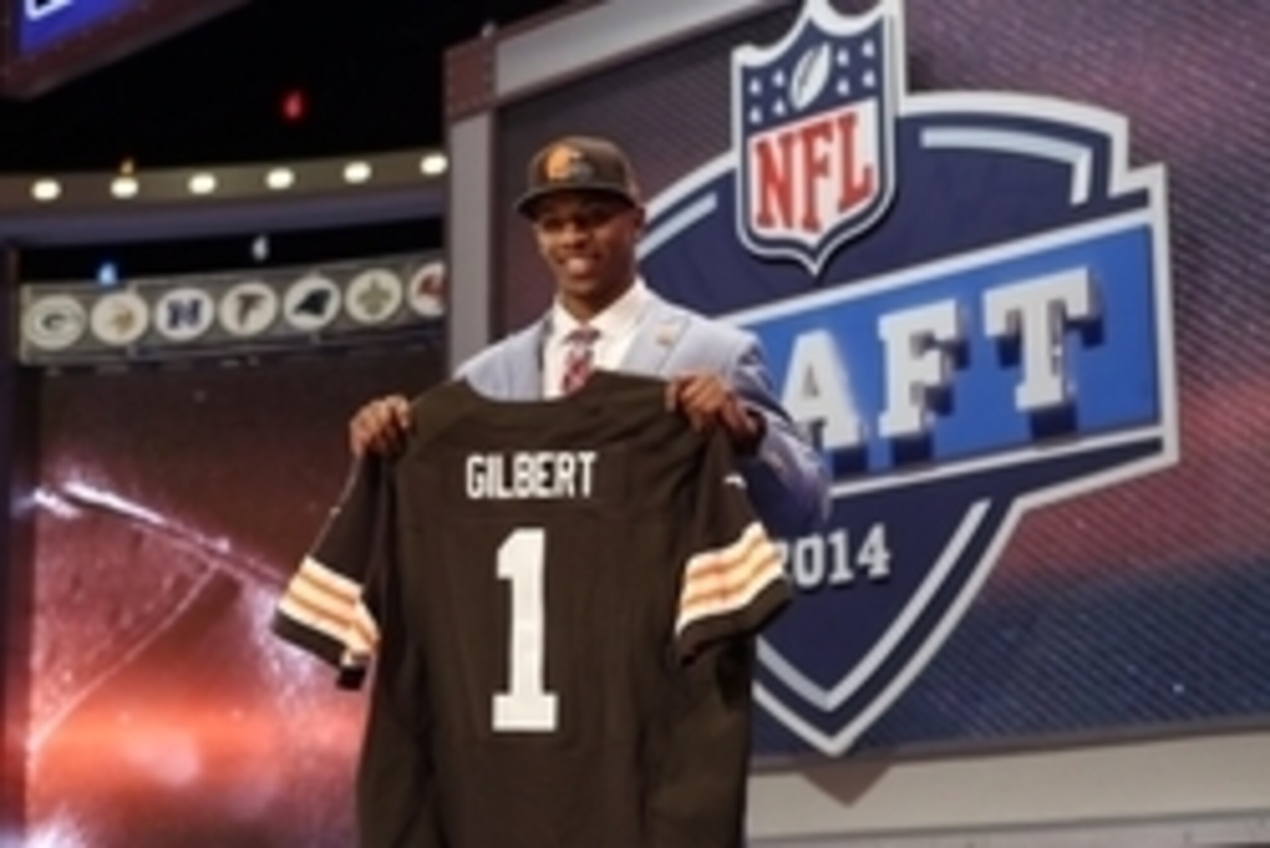 May 8, 2014; New York, NY, USA; Justin Gilbert (Oklahoma State) poses for a photo with his jersey after being selected as the number eight overall pick in the first round of the 2014 NFL Draft to the Cleveland Browns at Radio City Music Hall. Mandatory Cr