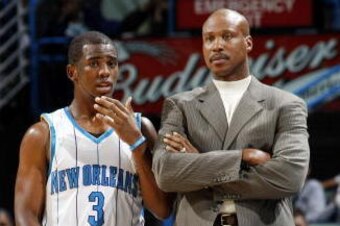 NEW ORLEANS - OCTOBER 17:  Byron Scott, head coach of the New Orleans Hornets talks to Chris Paul #3 on October 17, 2009 at the New Orleans Arena in New Orleans, Louisiana. NOTE TO USER: User expressly acknowledges and agrees that, by downloading and or u