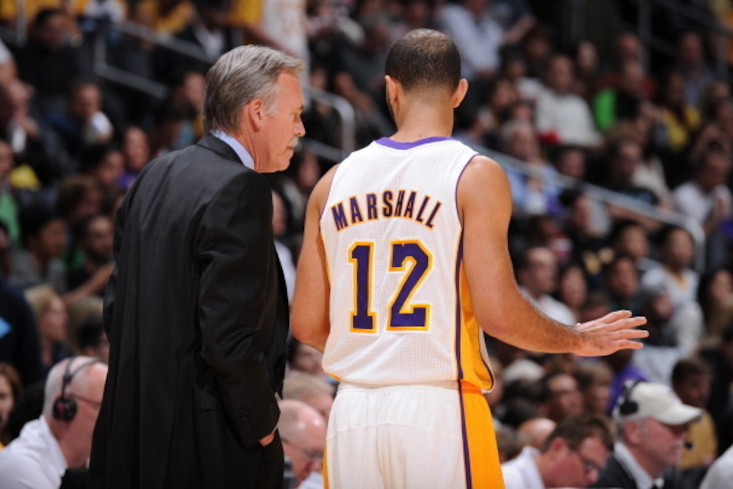 LOS ANGELES, CA - JANUARY 5: Mike D'Antoni and Kendall Marshall #12 of the Los Angeles Lakers converse during a game against the Denver Nuggets at STAPLES Center on January 5, 2014 in Los Angeles, California. NOTE TO USER: User expressly acknowledges and 