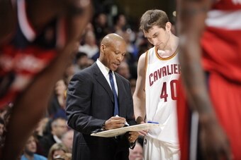 CLEVELAND, OH - MARCH 12:  Byron Scott, Head Coach of the Cleveland Cavaliers, talks with Tyler Zeller #40 during a break in action against the Washington Wizards at The Quicken Loans Arena on March 12, 2013 in Cleveland, Ohio. NOTE TO USER: User expressl