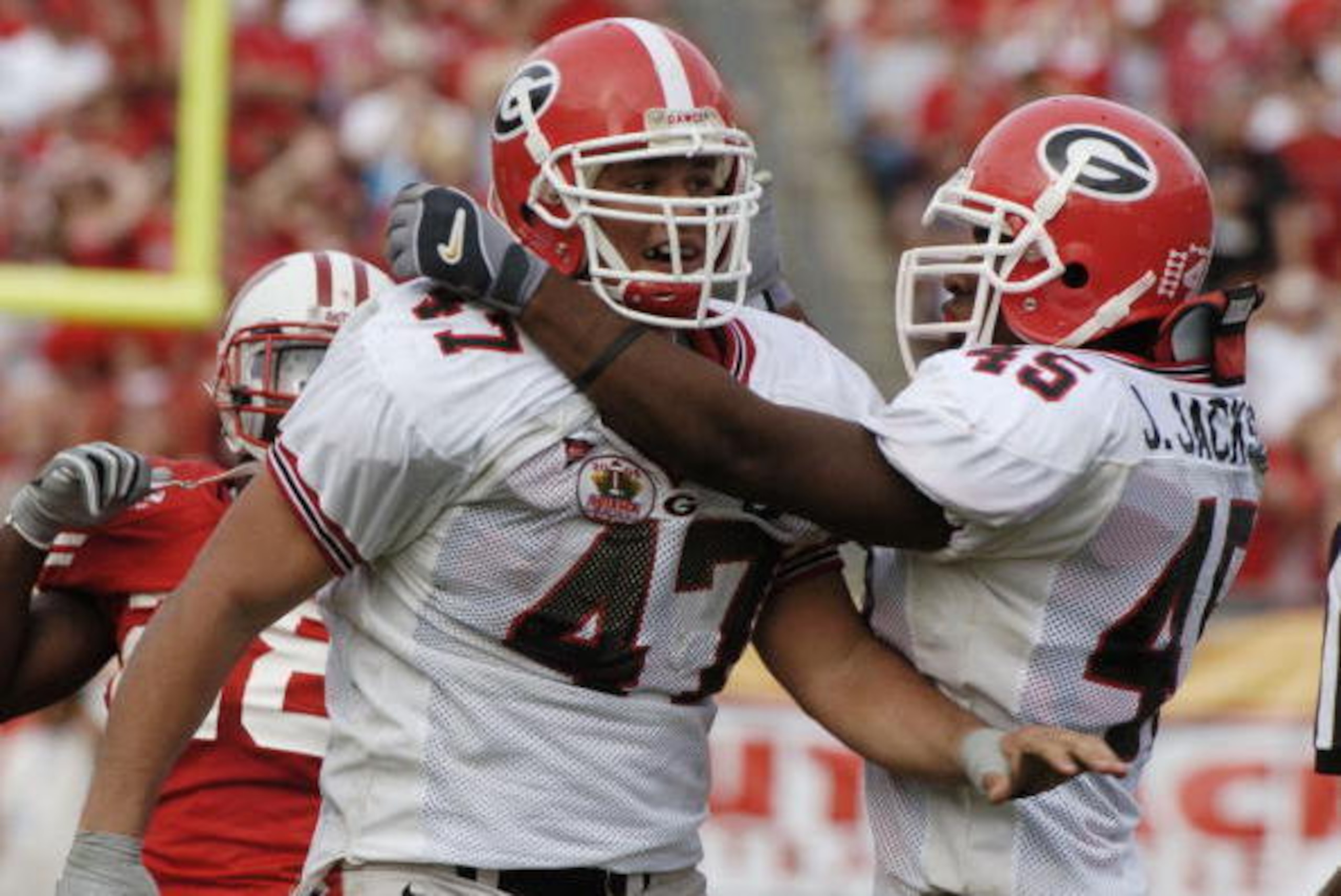 Georgia defensive end David Pollack celebrates a sack at the 2005 Outback Bowl January 1, 2005 at Raymond James Stadium, Tampa, Florida. Georgia defeated Wisconsin 24 - 21. (Photo by A. Messerschmidt/Getty Images) Georgia defensive end David Pollack celebrates a sack at the 2005 Outback Bowl January 1, 2005 at Raymond James Stadium, Tampa, Florida. Georgia defeated Wisconsin 24 - 21. (Photo by A. Messerschmidt/Getty Images)