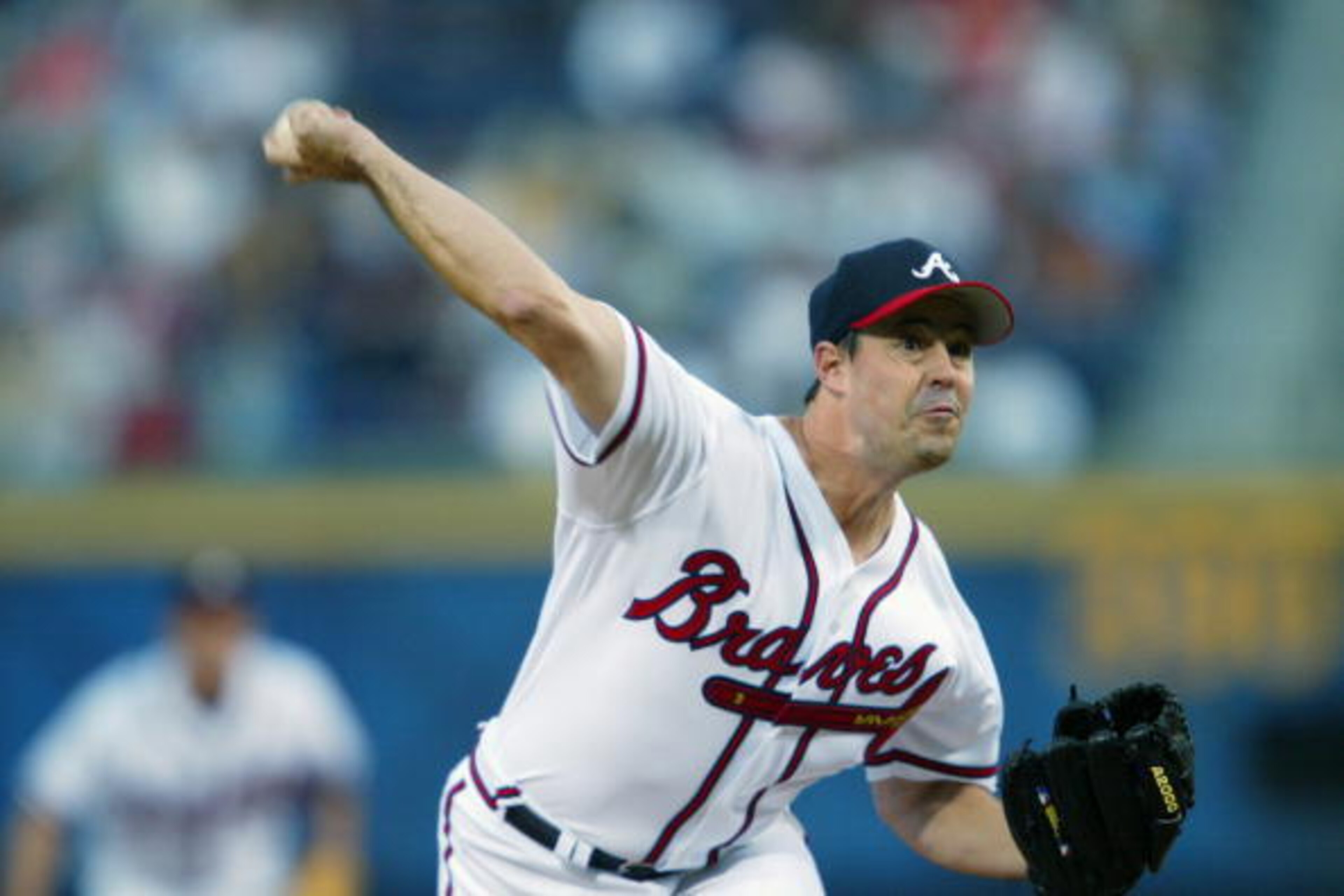 ATLANTA - APRIL 18: Starting pitcher Greg Maddux #31 of the Atlanta Braves in action during the first inning of the game against the Philadelphia Phillies at Turner Fieldon April 18, 2002 in Atlanta, Georgia. The Braves defeated the Phillies 5-4. (Phot ATLANTA - APRIL 18: Starting pitcher Greg Maddux #31 of the Atlanta Braves in action during the first inning of the game against the Philadelphia Phillies at Turner Fieldon April 18, 2002 in Atlanta, Georgia. The Braves defeated the Phillies 5-4. (Phot