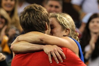 NEW YORK - SEPTEMBER 11:  Kim Clijsters of Belguim celebrates with her husband Brian Lynch after defeating Vera Zvonareva of Russia during their women's singles final on day thirteen of the 2010 U.S. Open at the USTA Billie Jean King National Tennis Cente