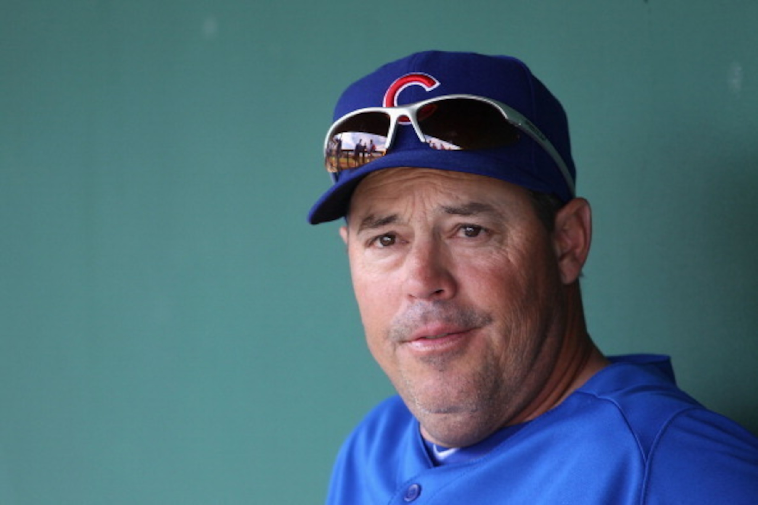 SCOTTSDALE, AZ - MARCH 01:  Greg Maddux of the Chicago Cubs sits in the dugout before the spring training game against the San Francisco Giants at Scottsdale Stadium on March 1, 2011 in Scottsdale, Arizona.  (Photo by Christian Petersen/Getty Images)