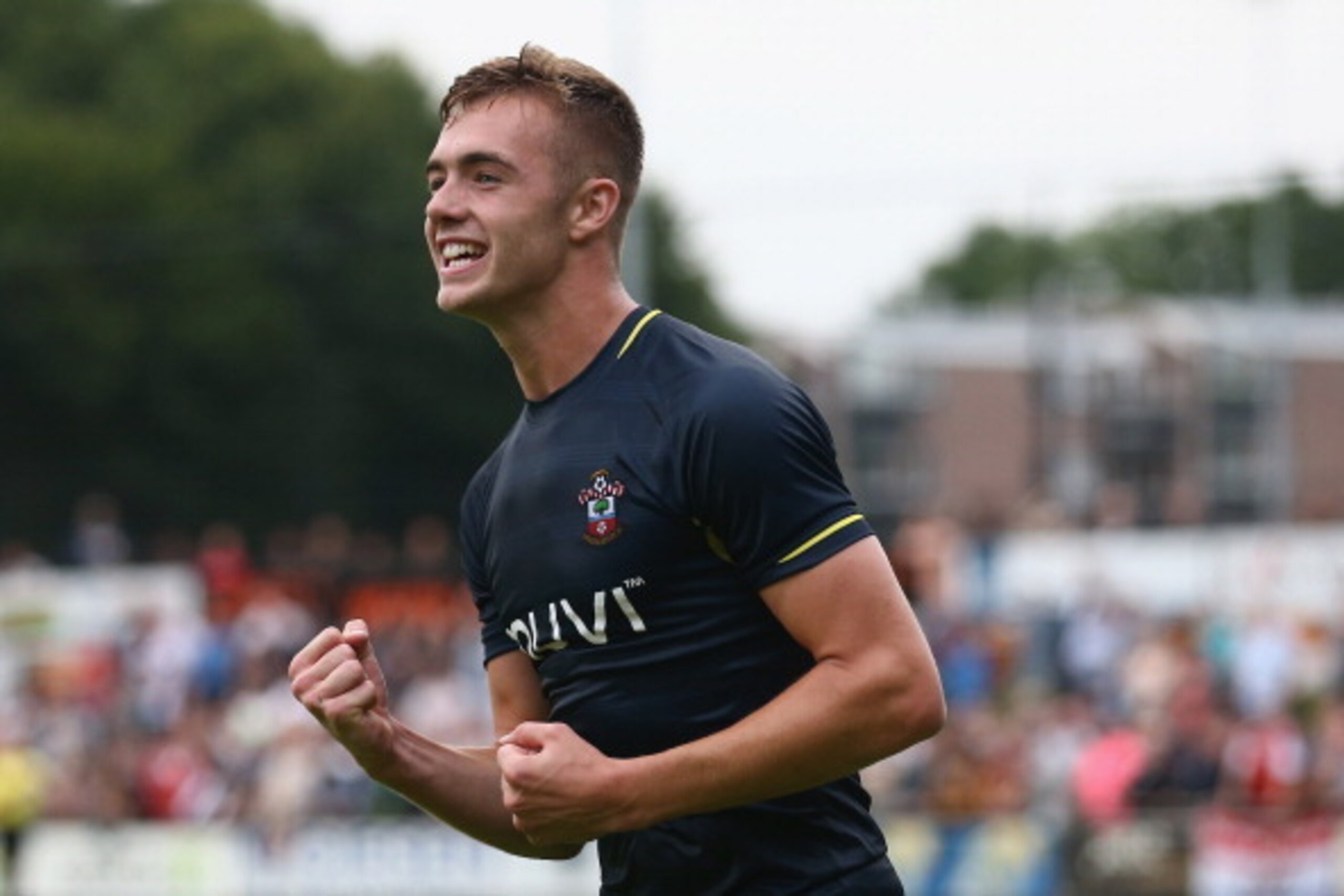 HOENSBROEK, NETHERLANDS - JULY 15:  Calum Chambers of Southampton celebrates the second goal during the pre season friendly match between EHC Hoensbroek and Southampton at Sportpark De Dem on July 15, 2014 in Hoensbroek, Netherlands.  (Photo by Christof K