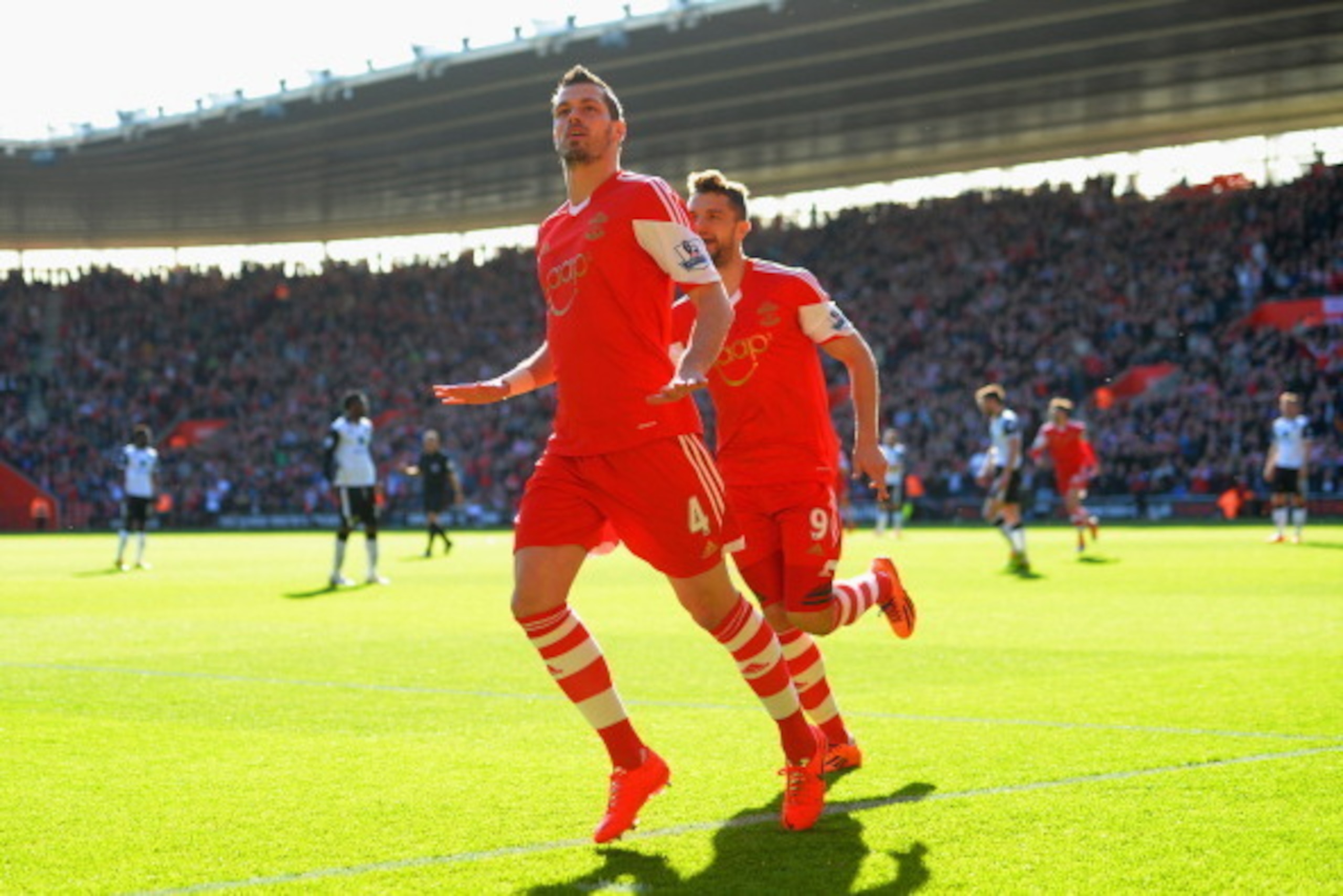 SOUTHAMPTON, ENGLAND - MARCH 15:  Morgan Schneiderlin of Southampton celebrates scoring the opening goal with Jay Rodriguez of Southampton during the Barclays Premier League match between Southampton and Norwich City at St Mary's Stadium on March 15, 2014