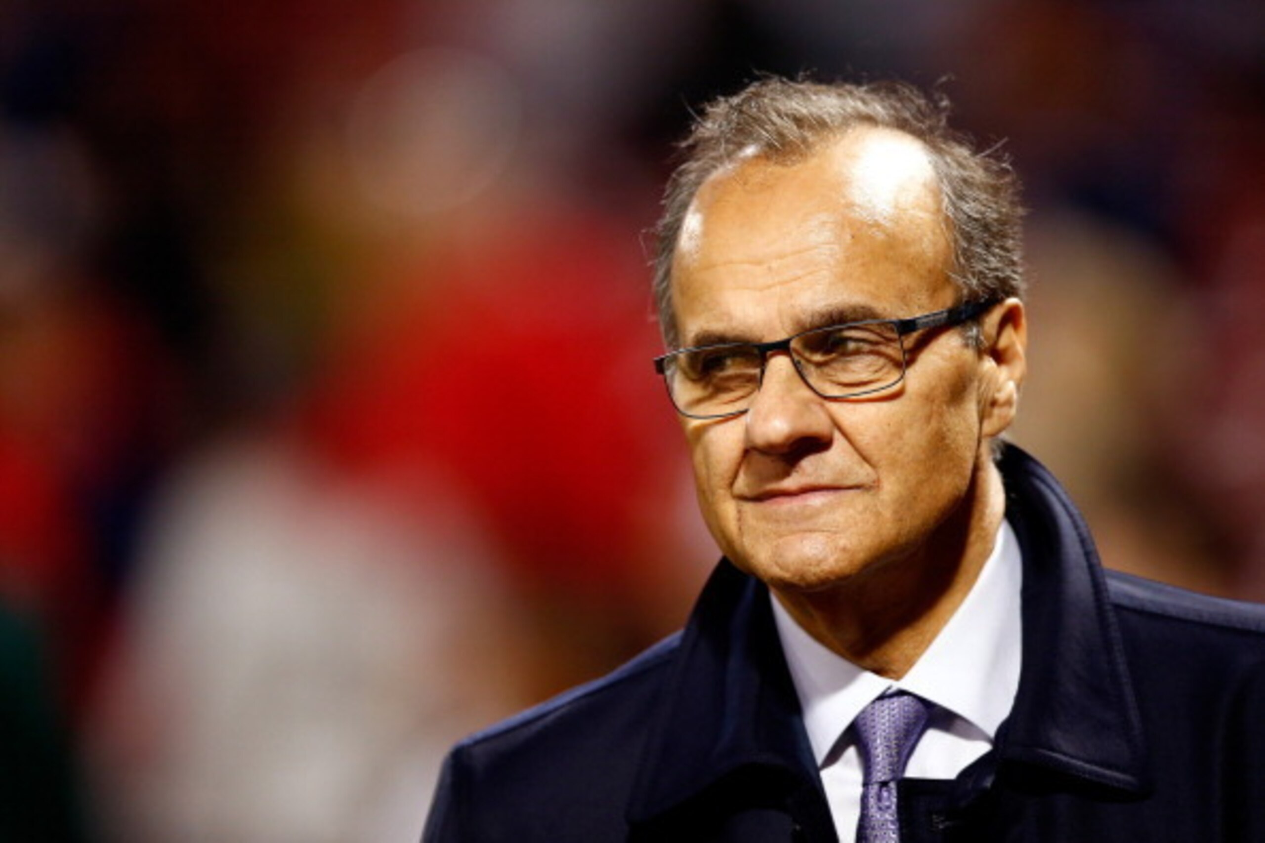 BOSTON, MA - OCTOBER 13: Joe Torre walks on the field before Game Two of the American League Championship Series between the Boston Red Sox and the Detroit Tigers at Fenway Park on October 13, 2013 in Boston, Massachusetts.  (Photo by Jared Wickerham/Gett