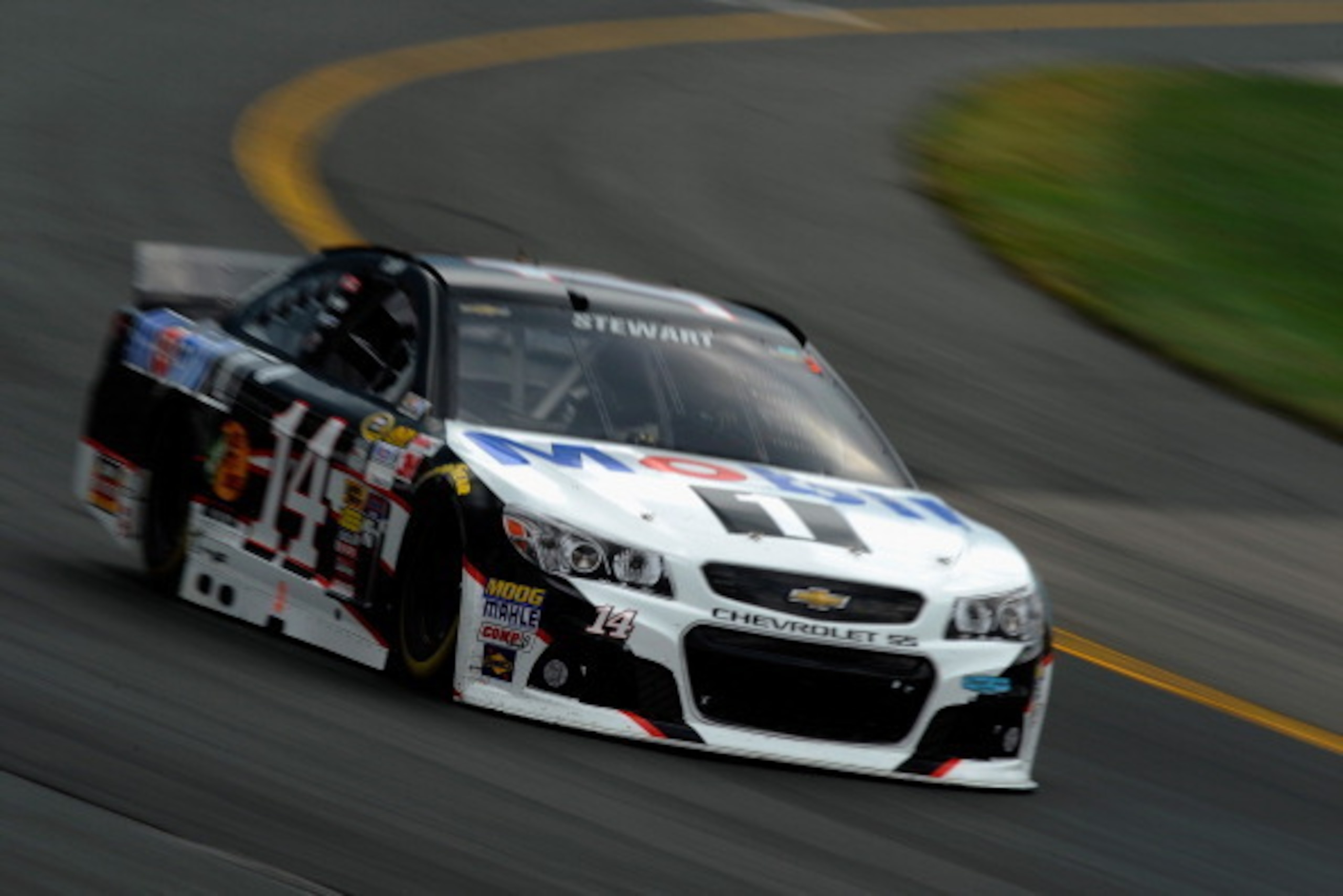 LOUDON, NH - JULY 13:  Tony Stewart, driver of the #14 Mobil 1 Chevrolet, races the NASCAR Sprint Cup Series Camping World RV Sales 301 at New Hampshire Motor Speedway on July 13, 2014 in Loudon, New Hampshire.  (Photo by Jared C. Tilton/Getty Images)