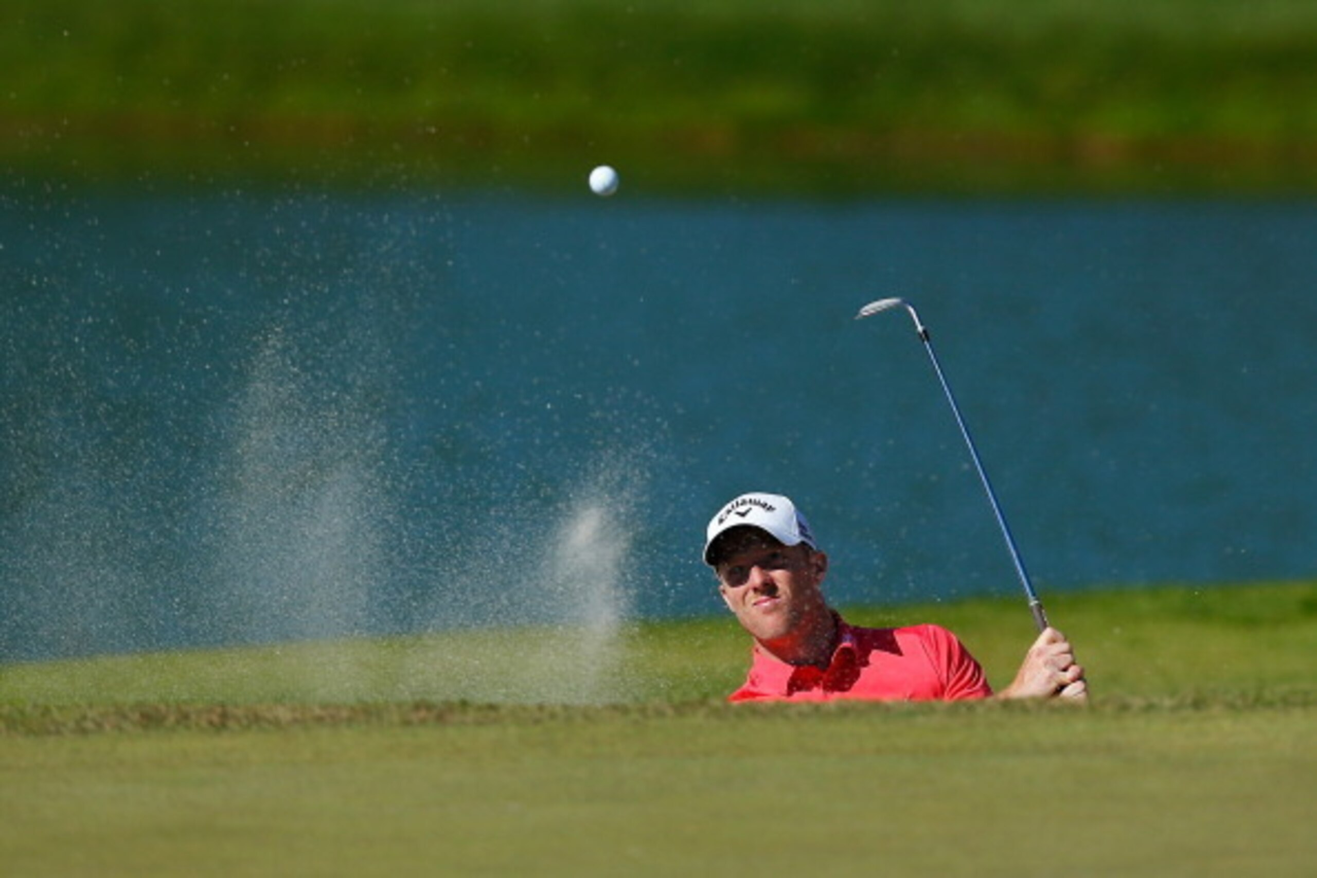 MOSCOW, RUSSIA - JULY 26:  David Horsey of England chips out of a bunker at the eighteenth on day three of the M2M Russian Open at Tseleevo Golf & Polo Club on July 26, 2014 in Moscow, Russia.  (Photo by Harry Engels/Getty Images)
