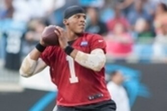 Jul 25, 2014; Charlotte, NC, USA; Carolina Panthers quarterback Cam Newton (1) throws a pass during training camp at Bank of America Stadium. Mandatory Credit: Jeremy Brevard-USA TODAY Sports