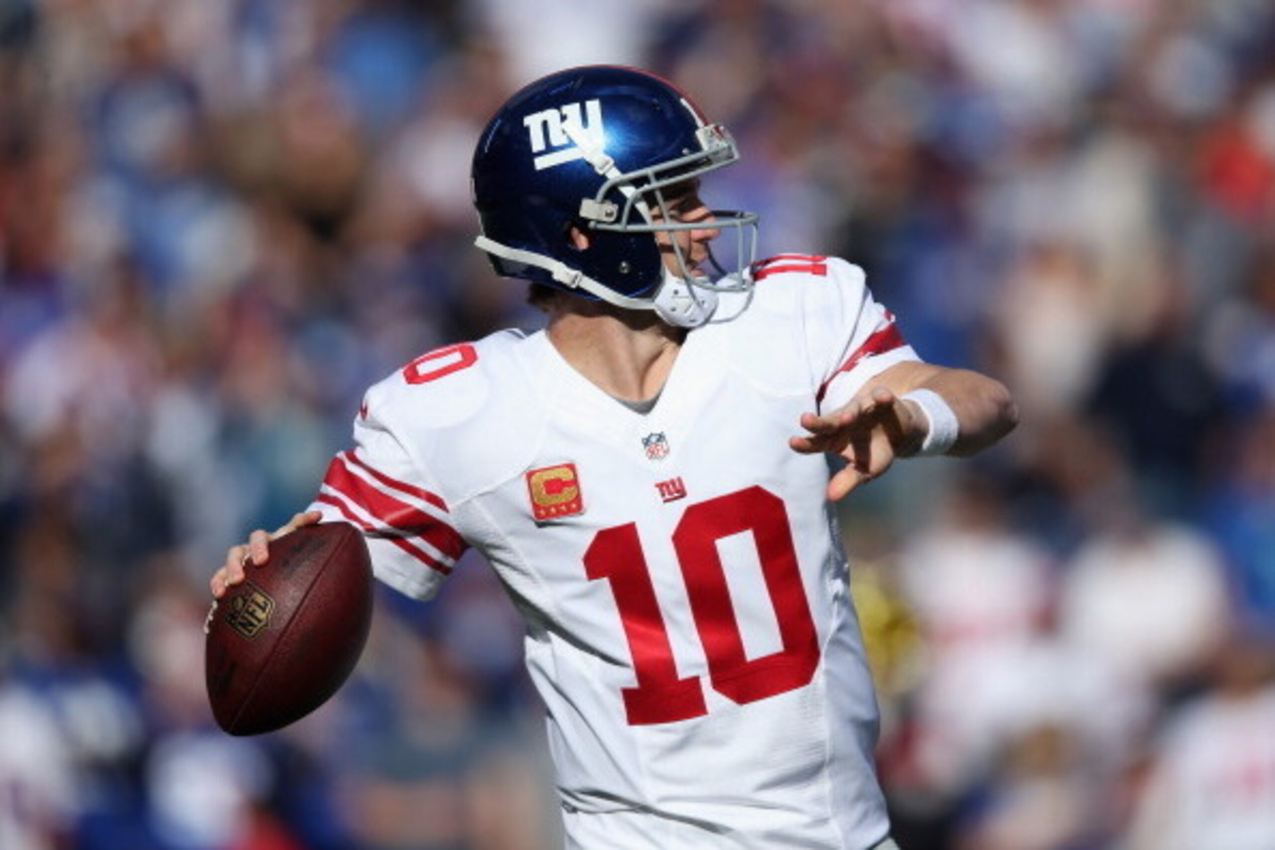SAN DIEGO, CA - DECEMBER 08:  Quarterback Eli Manning #10 of the New York Giants drops back to pass against the San Diego Chargers at Qualcomm Stadium on December 8, 2013 in San Diego, California.  (Photo by Jeff Gross/Getty Images)