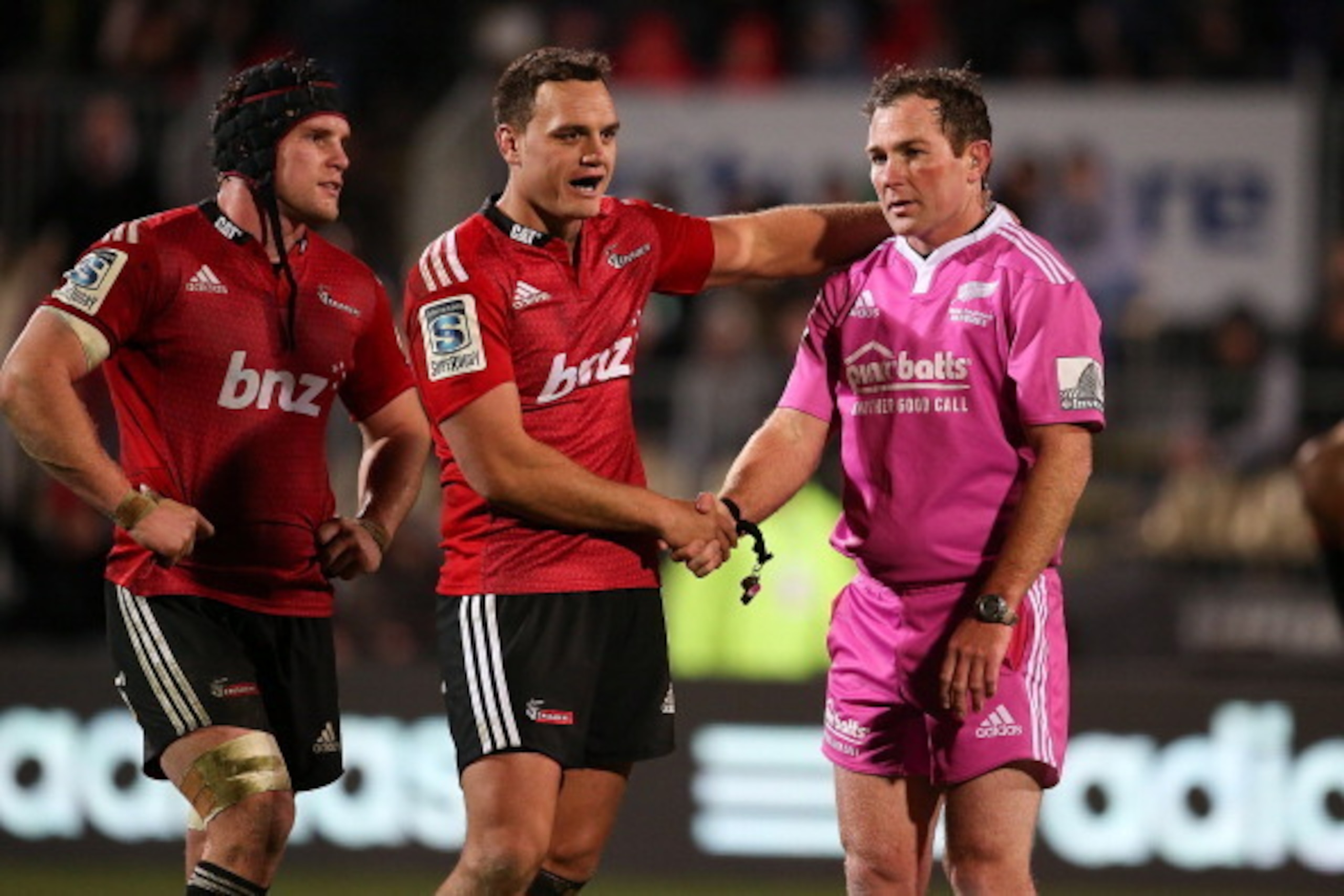 CHRISTCHURCH, NEW ZEALAND - JULY 05: (L-R) Matt Todd and Israel Dagg of the Crusaders congratulate referee Glen Jackson after the round 18 Super Rugby match between the Crusaders and the Blues at AMI Stadium on July 5, 2014 in Christchurch, New Zealand.  