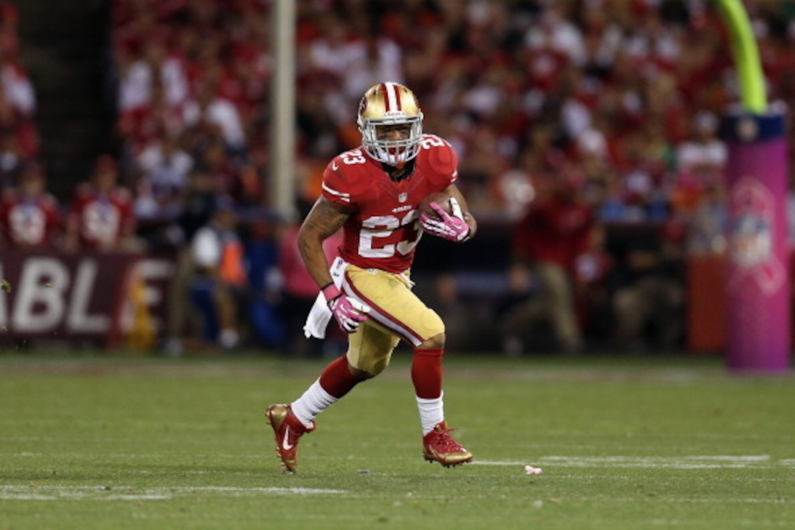 SAN FRANCISCO, CA - OCTOBER 06:  Running back LaMichael James #23 of the San Francisco 49ers  carries the ball against the Houston Texans at Candlestick Park on October 6, 2013 in San Francisco, California.  (Photo by Jeff Gross/Getty Images)