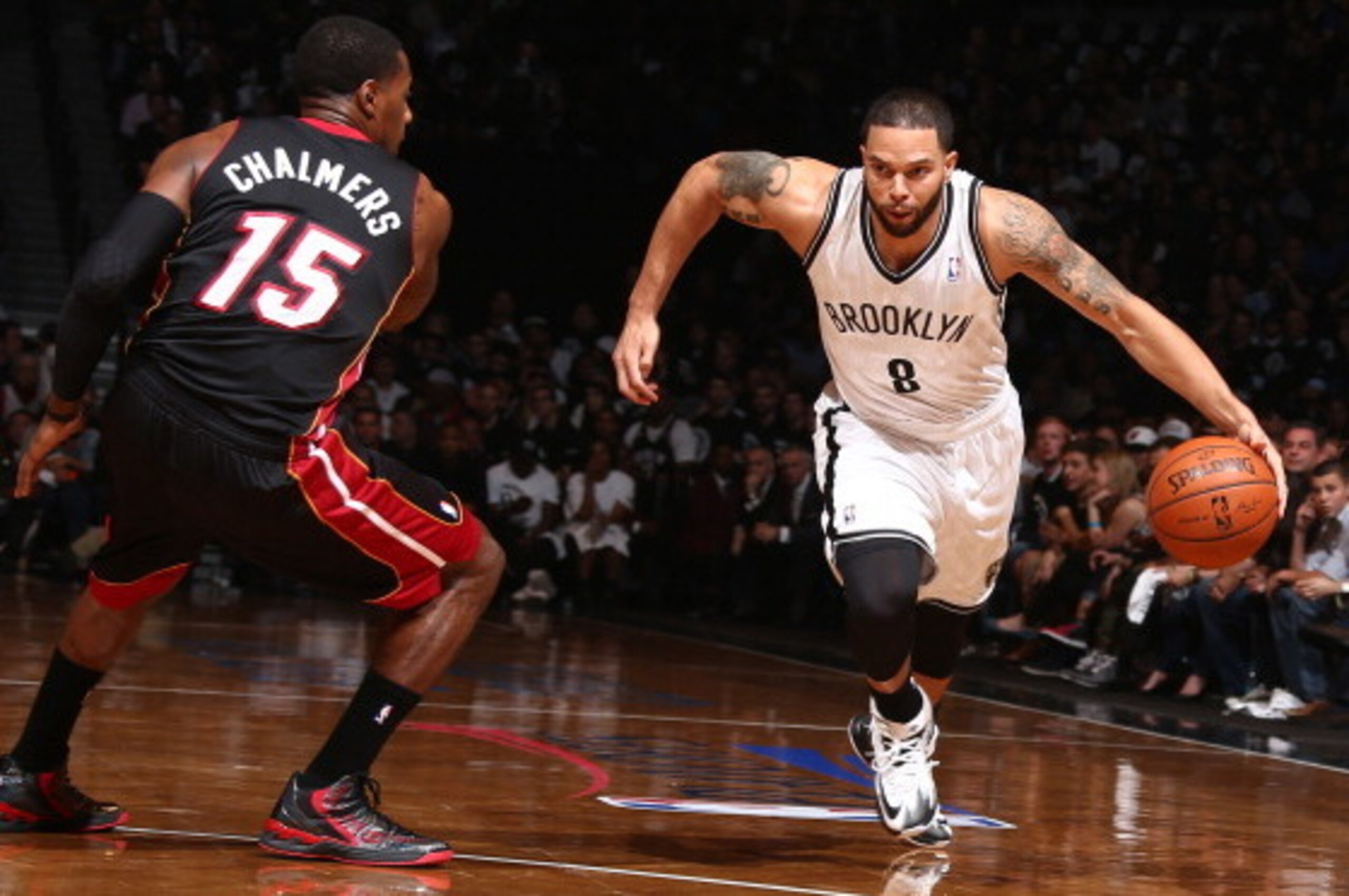 BROOKLYN, NY - MAY 10: Deron Williams #8 of the Brooklyn Nets handles the ball against the Miami Heat during Game Three of the Eastern Conference Semifinals on May 10, 2014 at Barclays Center in Brooklyn. NOTE TO USER: User expressly acknowledges and agre