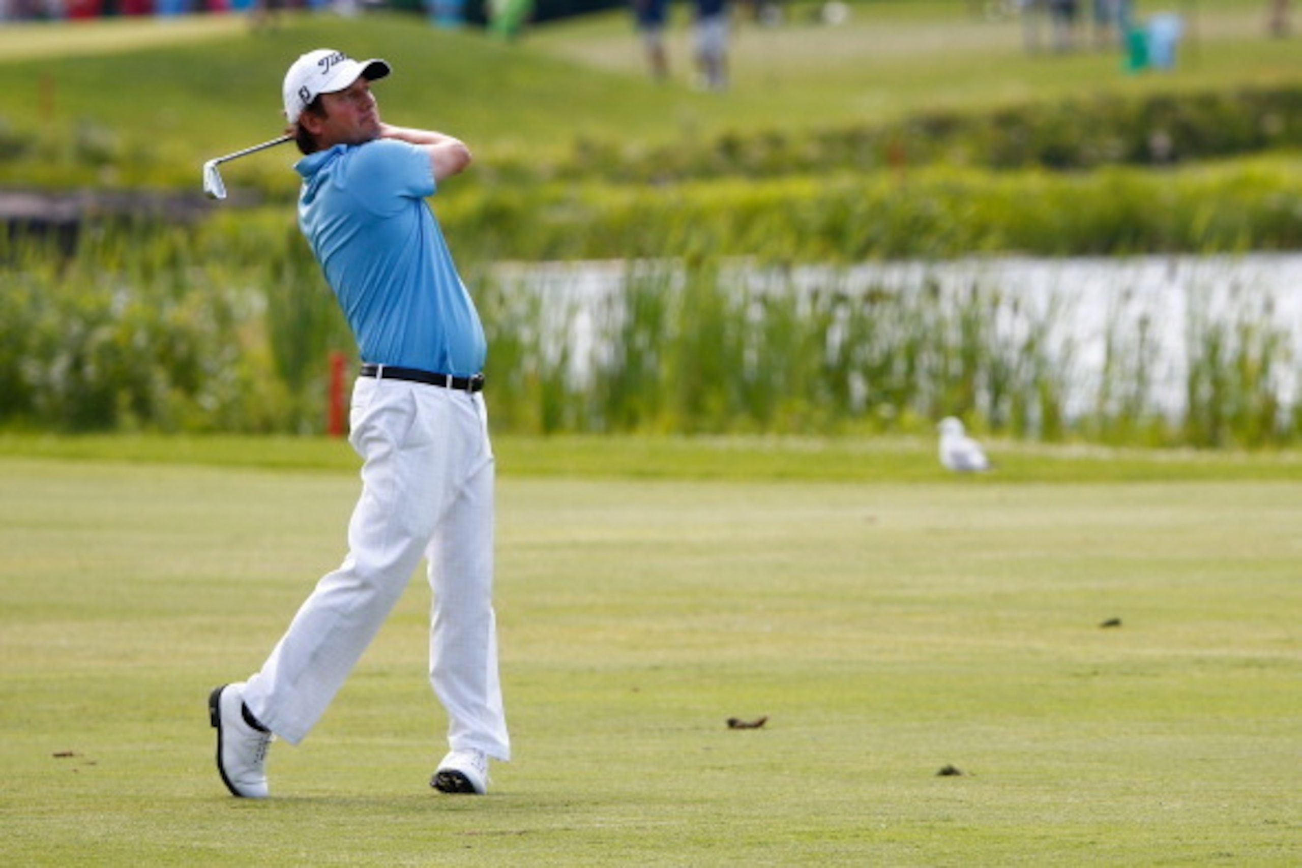MONTREAL, QC - JULY 26:  Tim Clark of South Africa hits his approach to the 15th green during the third round of the RBC Canadian Open at the Royal Montreal Golf Club on July 26, 2014 in Montreal, Quebec, Canada.  (Photo by Sam Greenwood/Getty Images)