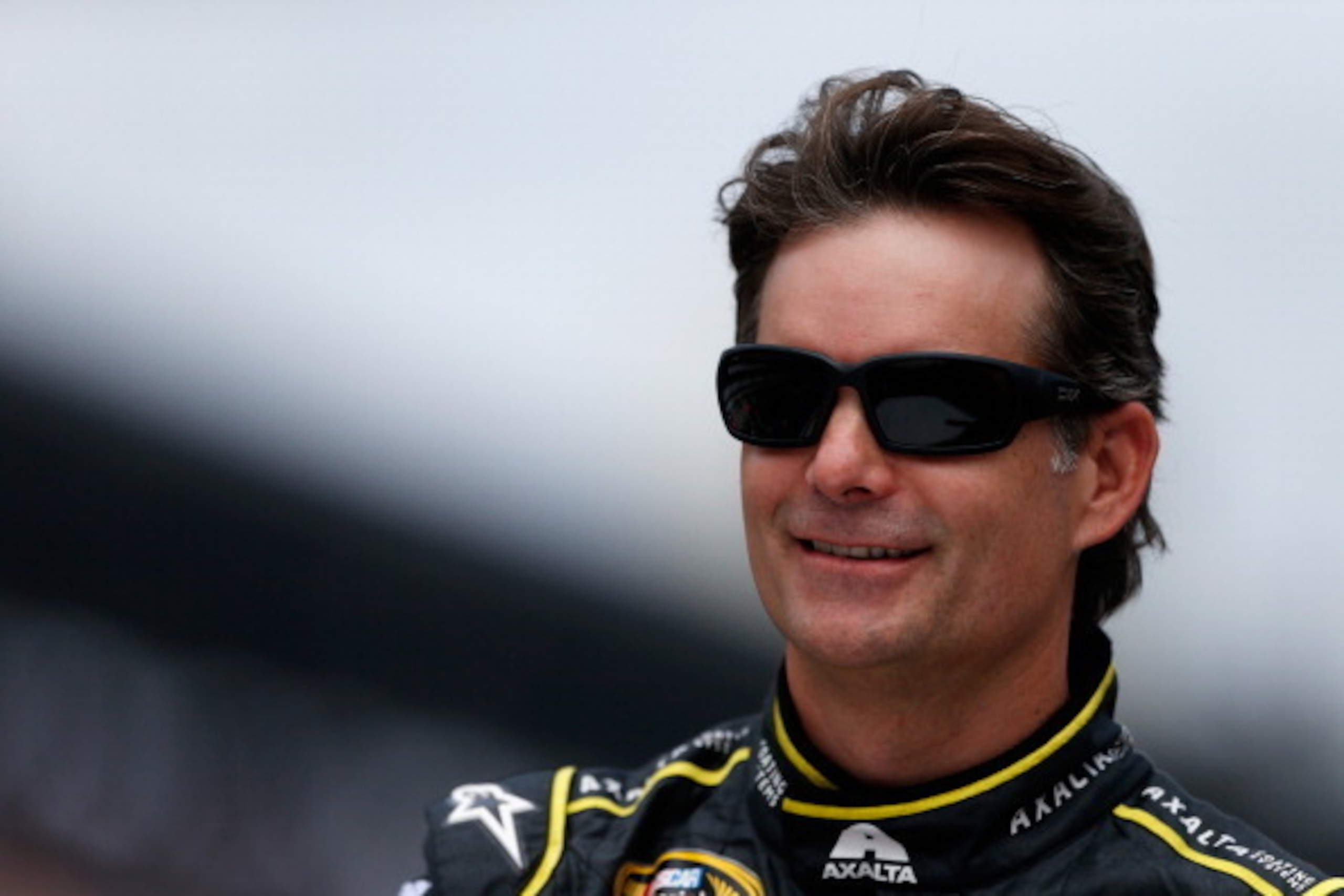INDIANAPOLIS, IN - JULY 27:  Jeff Gordon, driver of the #24 Axalta Chevrolet, participates in pre-race ceremonies for the NASCAR Sprint Cup Series Crown Royal Presents The John Wayne Walding 400 at the Brickyard Indianapolis Motor Speedway on July 27, 201