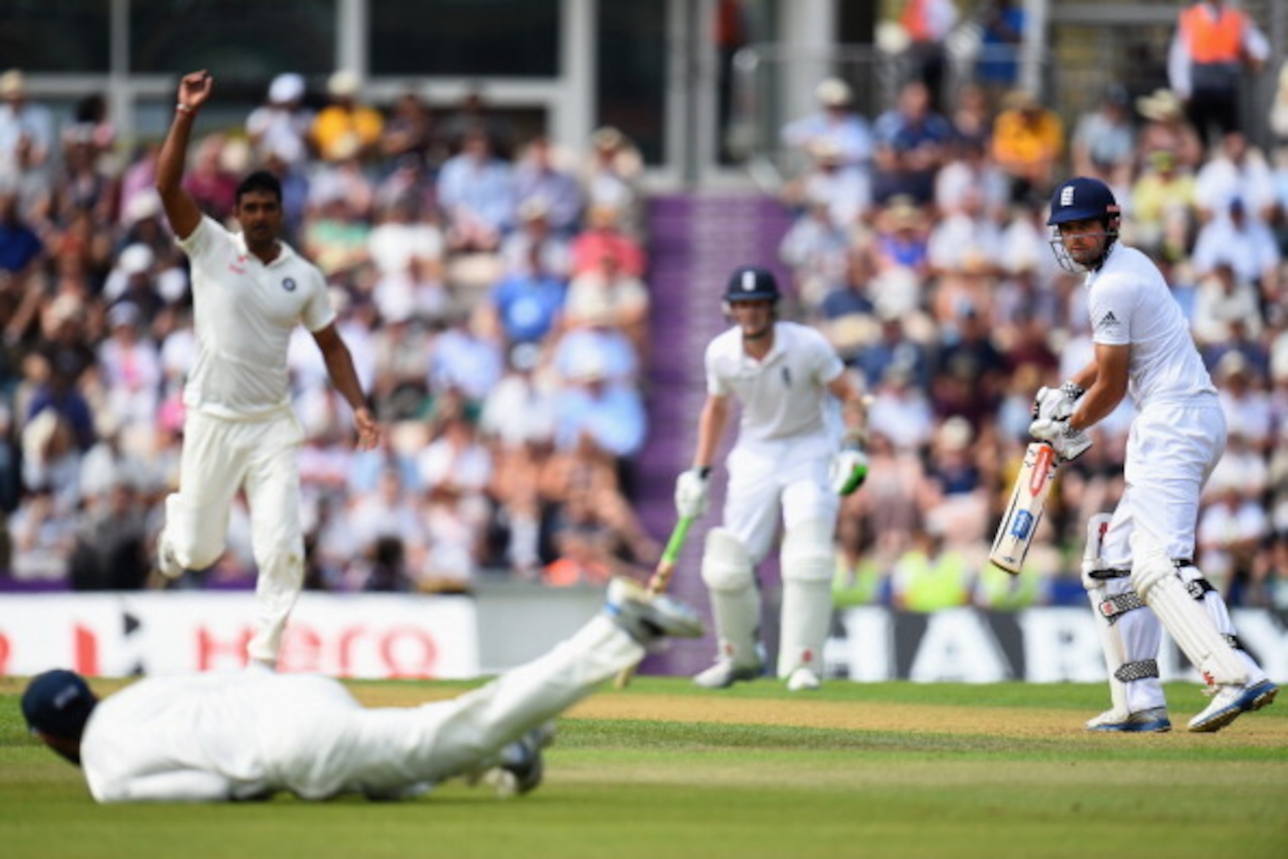 SOUTHAMPTON, ENGLAND - JULY 27:  Captain Alastair Cook of England looks back as he tips the ball towards Ravindra Jadeja of India who drops the catch during Day 1 of the 3rd Investec Test match between England and India at the Ageas Bowl on July 27, 2014 