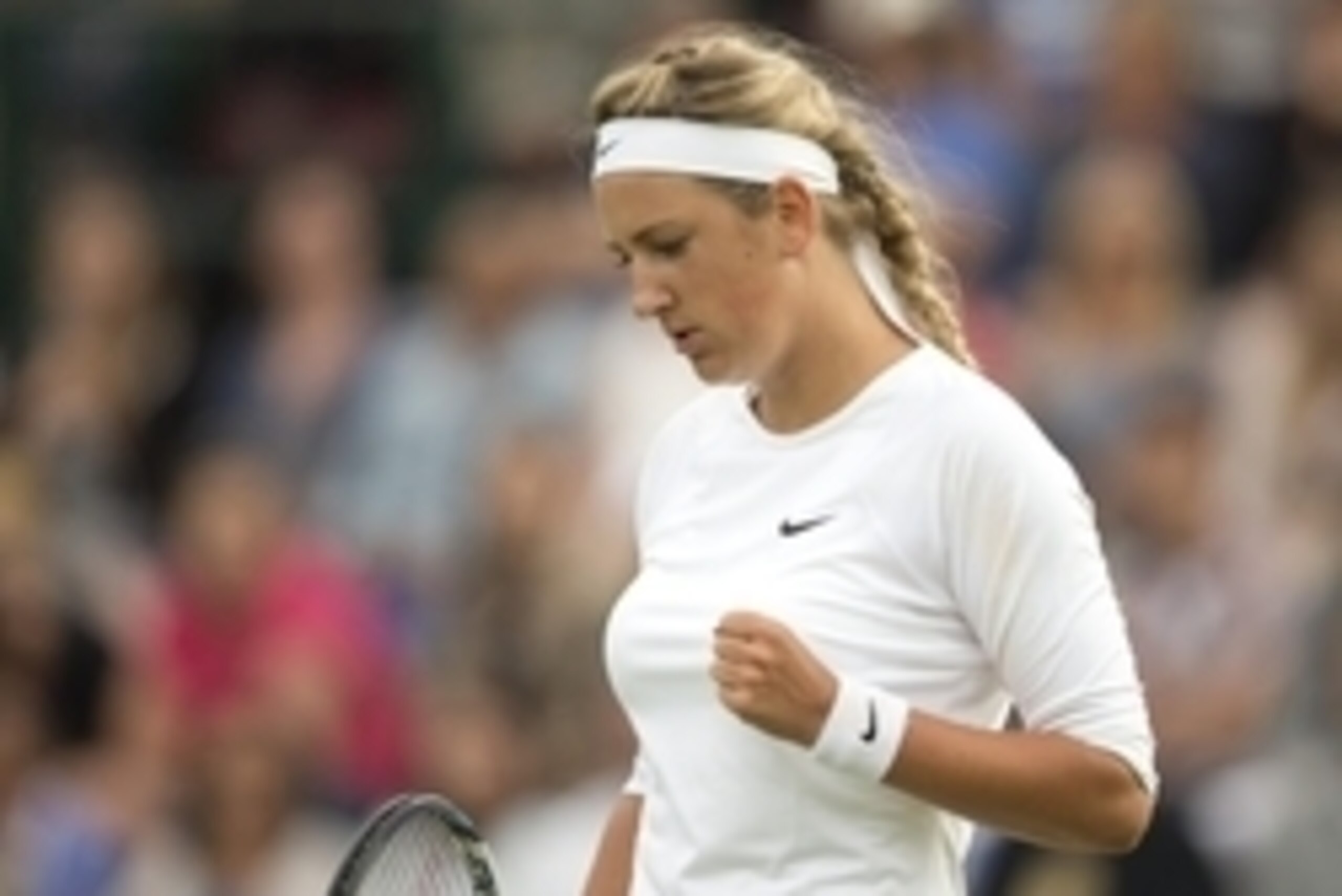 Jun 25, 2014; London, United Kingdom; Victoria Azarenka (BLR) reacts during her match against Bojana Jovanovski (SRB) on day three of the 2014 Wimbledon Championships at the All England Lawn and Tennis Club. Mandatory Credit: Susan Mullane-USA TODAY Sport