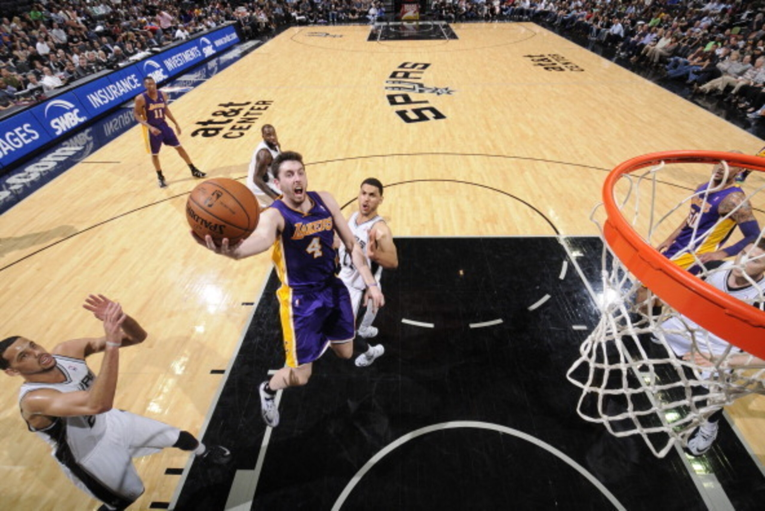 SAN ANTONIO, TX - April 16: Ryan Kelly #4 of the Los Angeles Lakers shoots against the San Antonio Spurs at the AT&T Center on April 16, 2014 in San Antonio, Texas. NOTE TO USER: User expressly acknowledges and agrees that, by downloading and or using thi