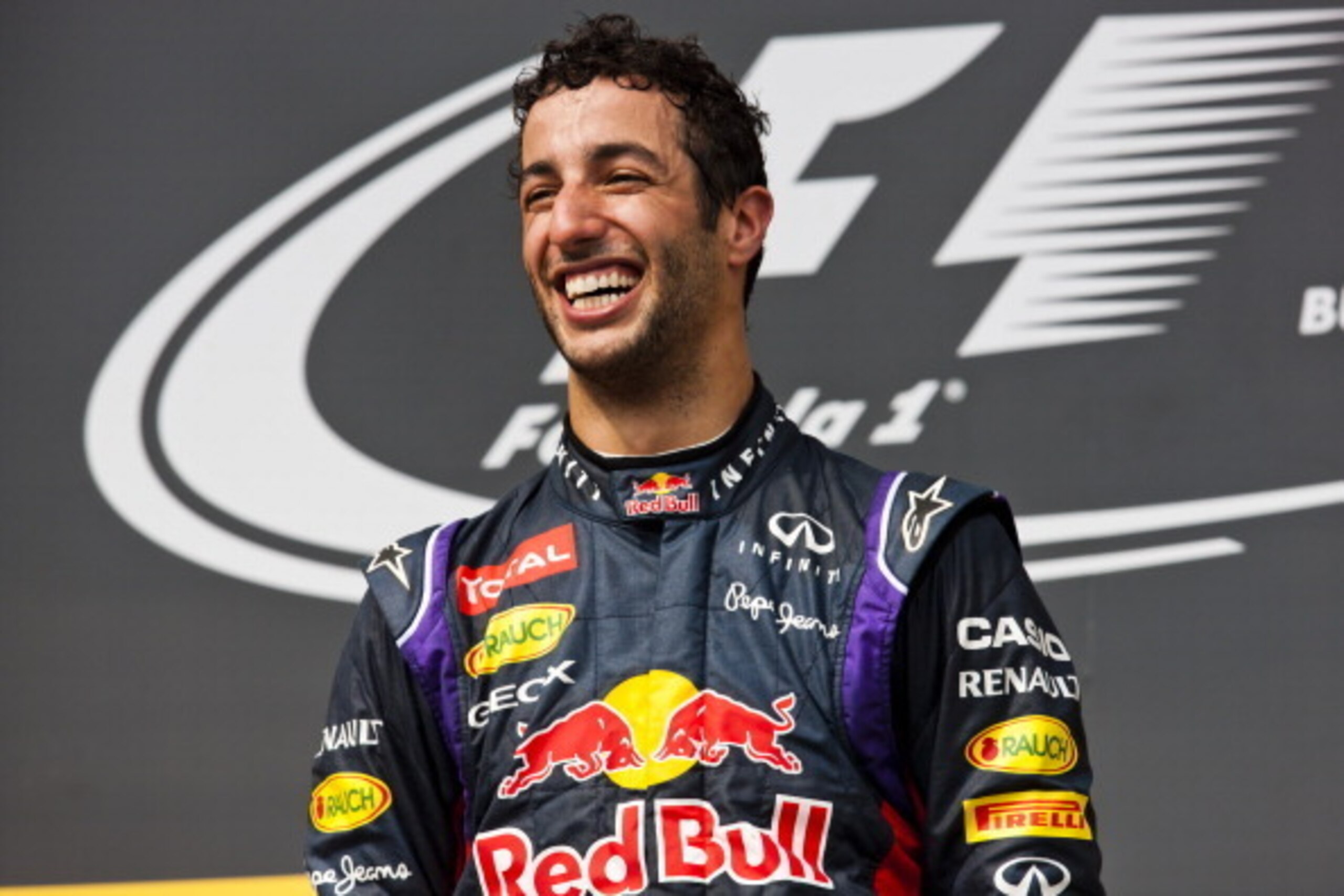 BUDAPEST, HUNGARY - JULY 27:  Daniel Ricciardo of Australia and Infiniti Red Bull Racing celebrates victory on the podium after the Hungarian Formula One Grand Prix at Hungaroring on July 27, 2014 in Budapest, Hungary.  (Photo by Drew Gibson/Getty Images)
