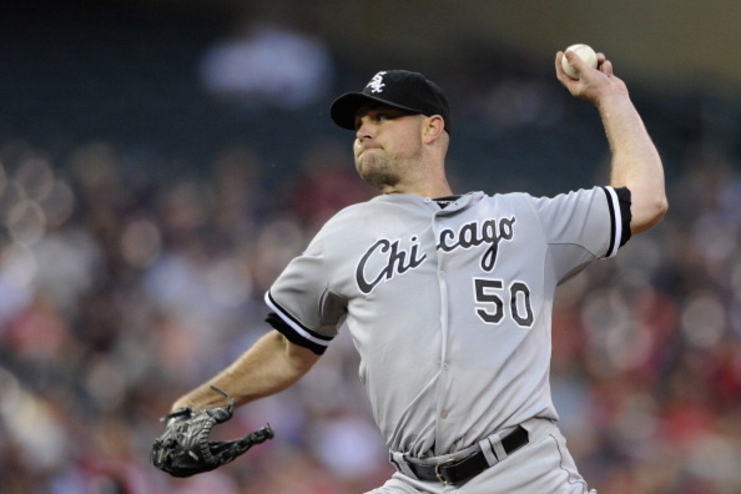 MINNEAPOLIS, MN - JULY 25: John Danks #50 of the Chicago White Sox delivers a pitch against the Minnesota Twins during the first inning of the game on July 25, 2014 at Target Field in Minneapolis, Minnesota. (Photo by Hannah Foslien/Getty Images)