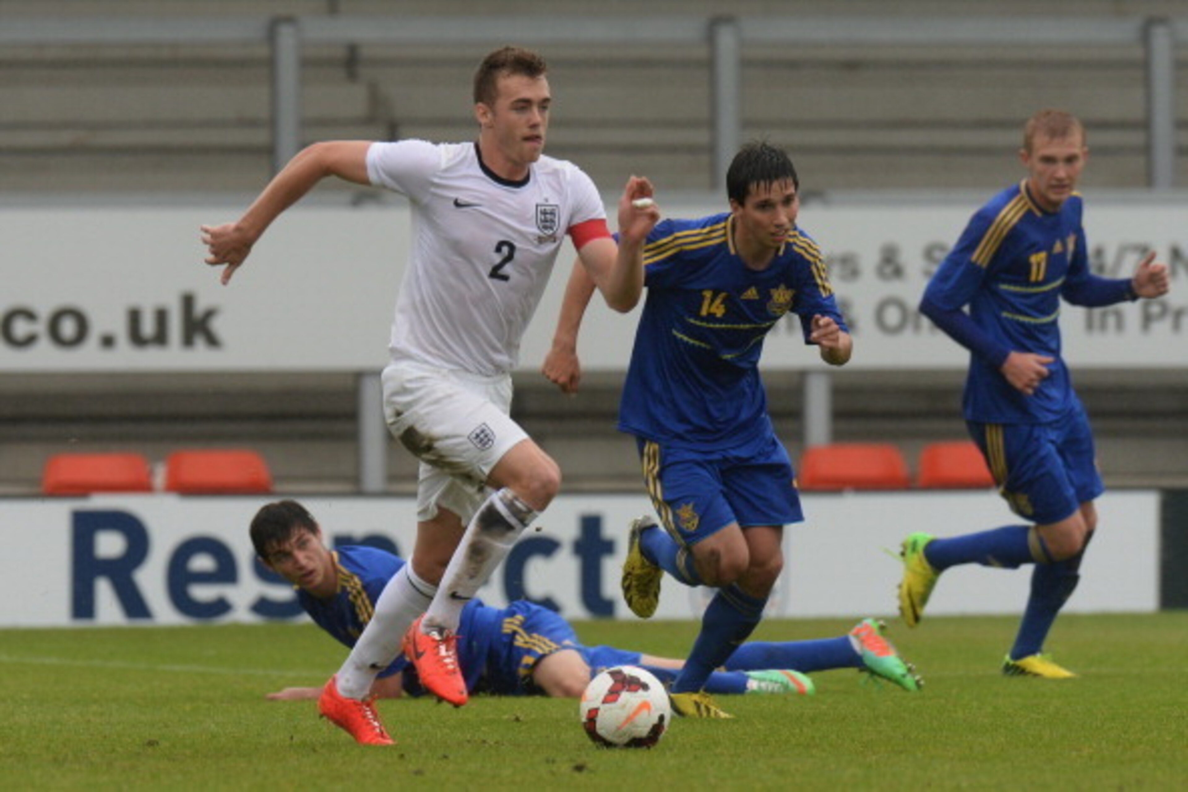 BURTON UPON TRENT, ENGLAND - MAY 29:  Calum Chambers of England U19 pushes forward during the Uefa U19 Championship Elite Round match between England U19 and Ukraine U19 at Pirelli Stadium on May 29, 2014 in Burton upon Trent, England.  (Photo by Tony Mar
