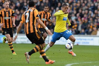 HULL, ENGLAND - MARCH 01: Loic Remy of Newcastle United battles his way through during the Barclays Premier League match between Hull City and Newcastle United at KC Stadium on March 1, 2014 in Hull, England.  (Photo by Tony Marshall/Getty Images)