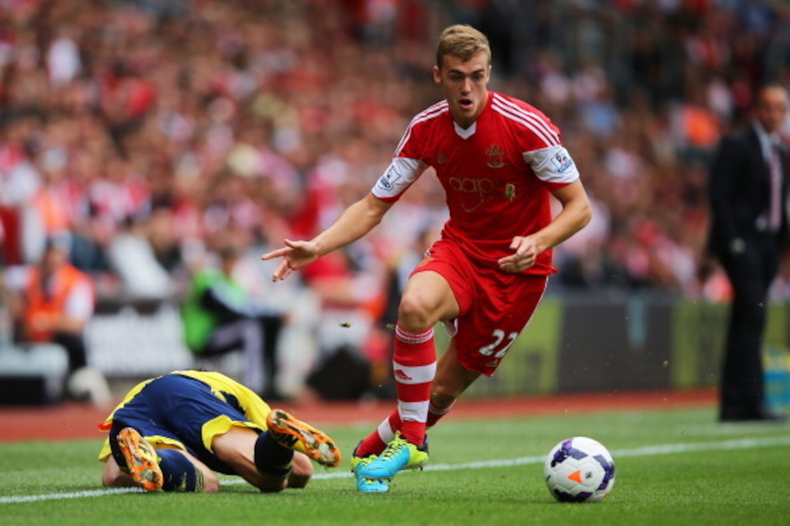 SOUTHAMPTON, ENGLAND - AUGUST 24:   Calum Chambers of Southampton wins the ball during the Barclays Premier League match between Southampton and Sunderland at St Mary's Stadium on August 24, 2013 in Southampton, England.  (Photo by Clive Rose/Getty Images