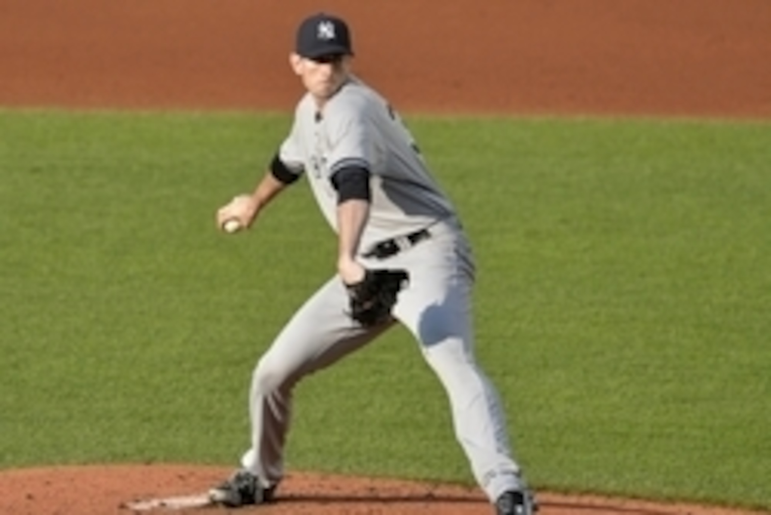 Jul 9, 2014; Cleveland, OH, USA; New York Yankees starting pitcher Brandon McCarthy (38) delivers in the first inning against the Cleveland Indians at Progressive Field. Mandatory Credit: David Richard-USA TODAY Sports