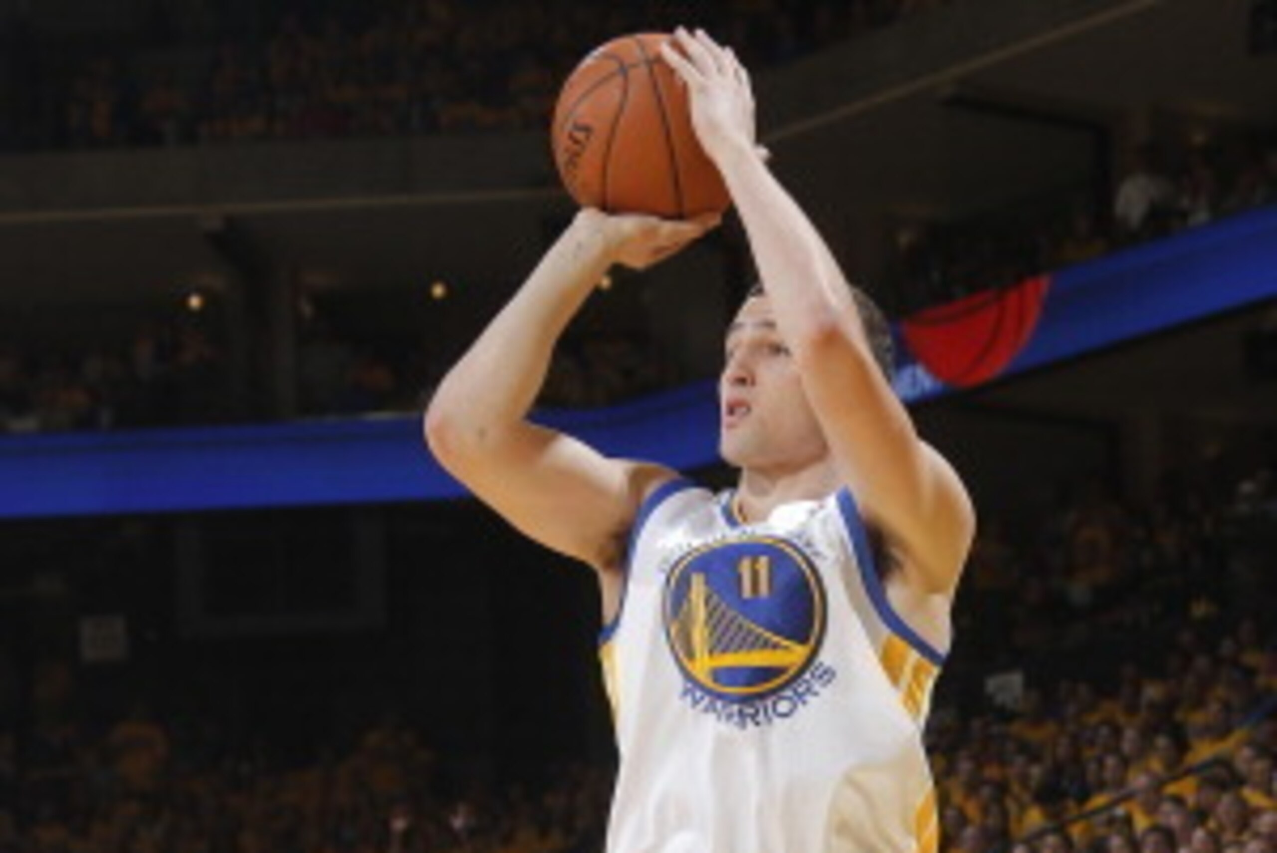 OAKLAND, CA - MAY 1: Klay Thompson #11 of the Golden State Warriors shoots a three pointer against the Los Angeles Clippers in Game Six of the Western Conference Quarterfinals during the 2014 NBA Playoffs at Oracle Arena on May 1, 2014 in Oakland, Califor