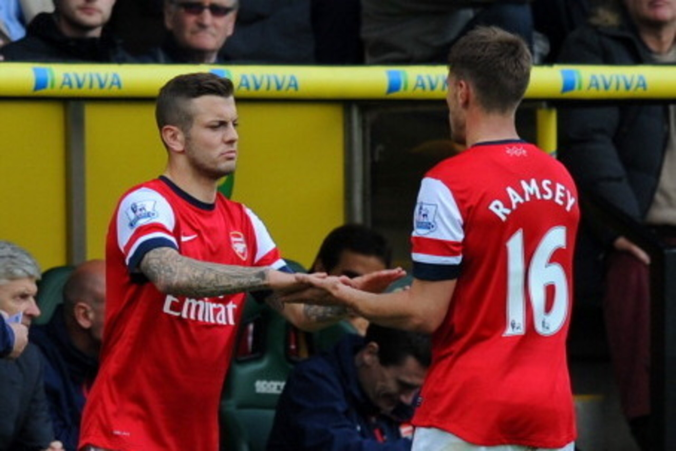 NORWICH, ENGLAND - MAY 11: Jack Wilshere of Arsenal replaces Aaron Ramsey of Arsenal during the Barclays Premier League match between Norwich City and Arsenal at Carrow Road on May 11, 2014 in Norwich, England.  (Photo by Steve Bardens/Getty Images)