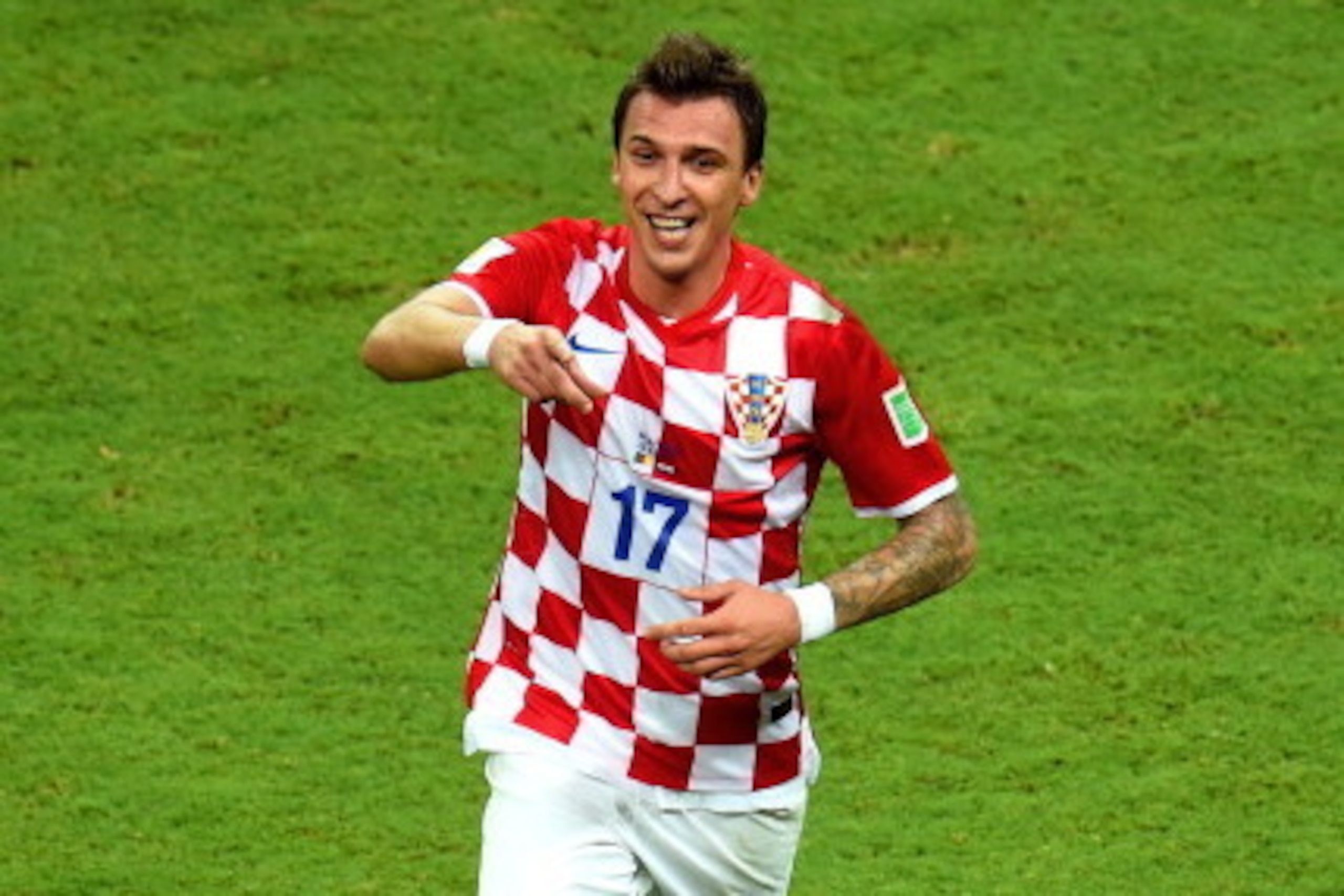 MANAUS, BRAZIL - JUNE 18:  Mario Mandzukic of Croatia celebrates scoring the third goal during the 2014 FIFA World Cup Brazil Group A match between Cameroon and Croatia at Arena Amazonia on June 18, 2014 in Manaus, Brazil.  (Photo by Stu Forster/Getty Ima