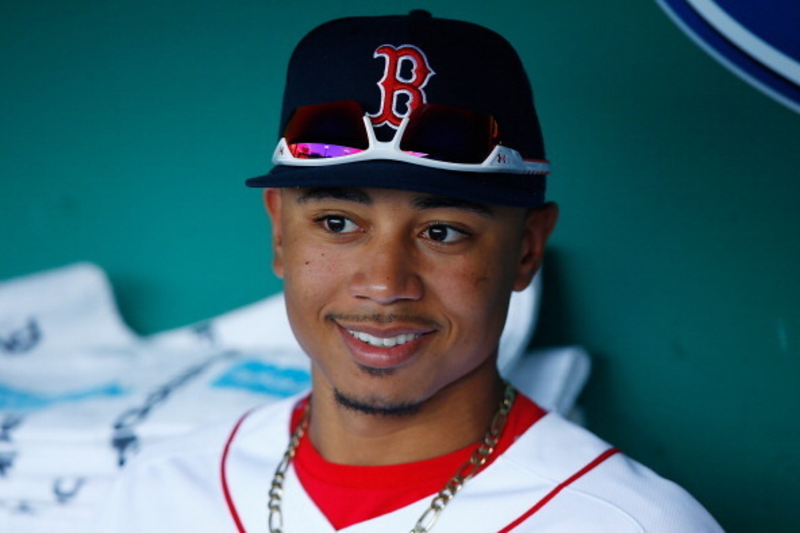 BOSTON, MA - JUNE 30:  Mookie Betts #50 of the Boston Red Sox sits in the dugout prior to the start of the game against the Chicago Cubs at Fenway Park on June 30, 2014 in Boston, Massachusetts.  (Photo by Jared Wickerham/Getty Images)