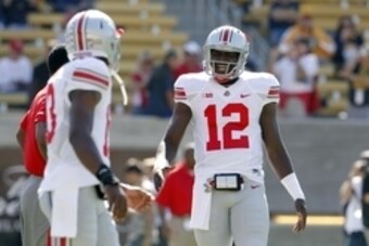 Sep 14, 2013; Berkeley, CA, USA; Ohio State Buckeyes quarterback Cardale Jones (12) stands on the field before the start of the game against the California Golden Bears at Memorial Stadium. Mandatory Credit: Cary Edmondson-USA TODAY Sports