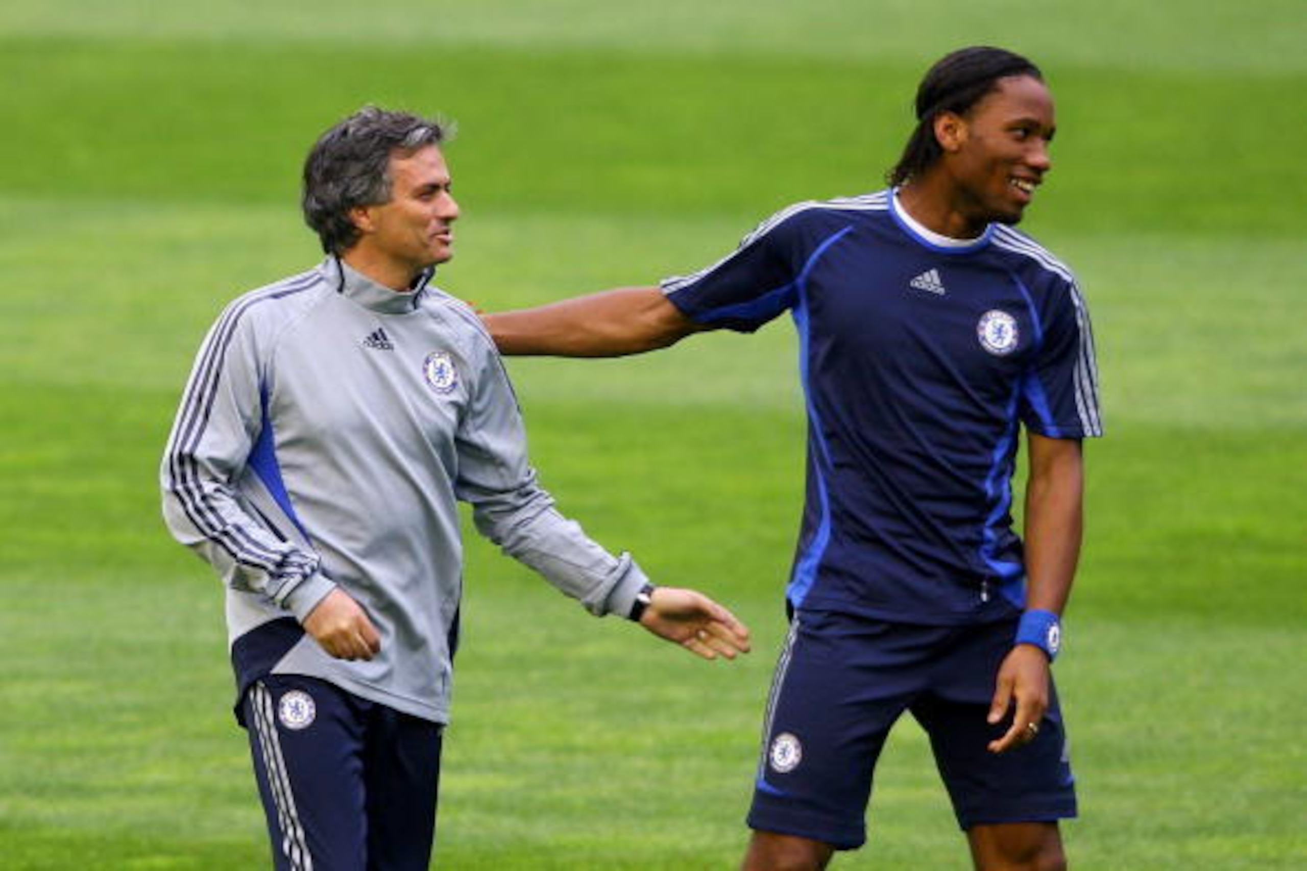 VALENCIA, SPAIN - APRIL 09:  Chelsea Coach Jose Mourinho (R) shares a joke with striker Didier Drogba  during Chelsea training and press conference today ahead of tomorrows Champions League Quarter Final Second Leg at the Stadium Mestalla on April 9, 2007