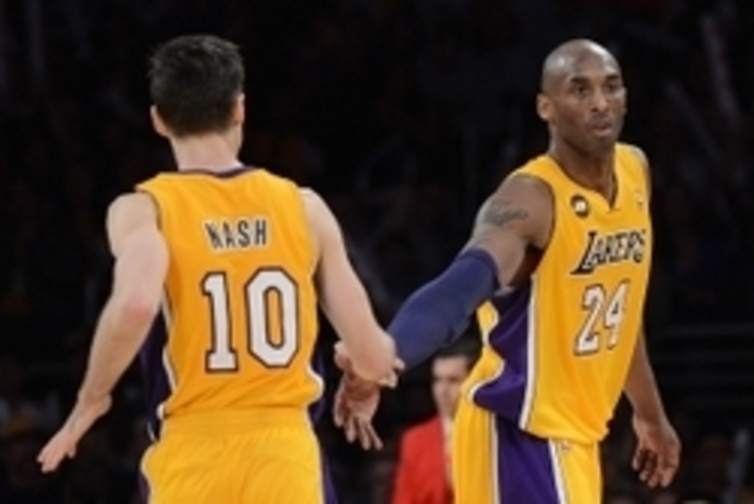 Mar 22, 2013; Los Angeles, CA, USA;  Los Angeles Lakers shooting guard Kobe Bryant (24) and point guard Steve Nash (10) in the second half of the game against the Washington Wizards at the Staples Center. Wizards won 103-100. Mandatory Credit: Jayne Kamin