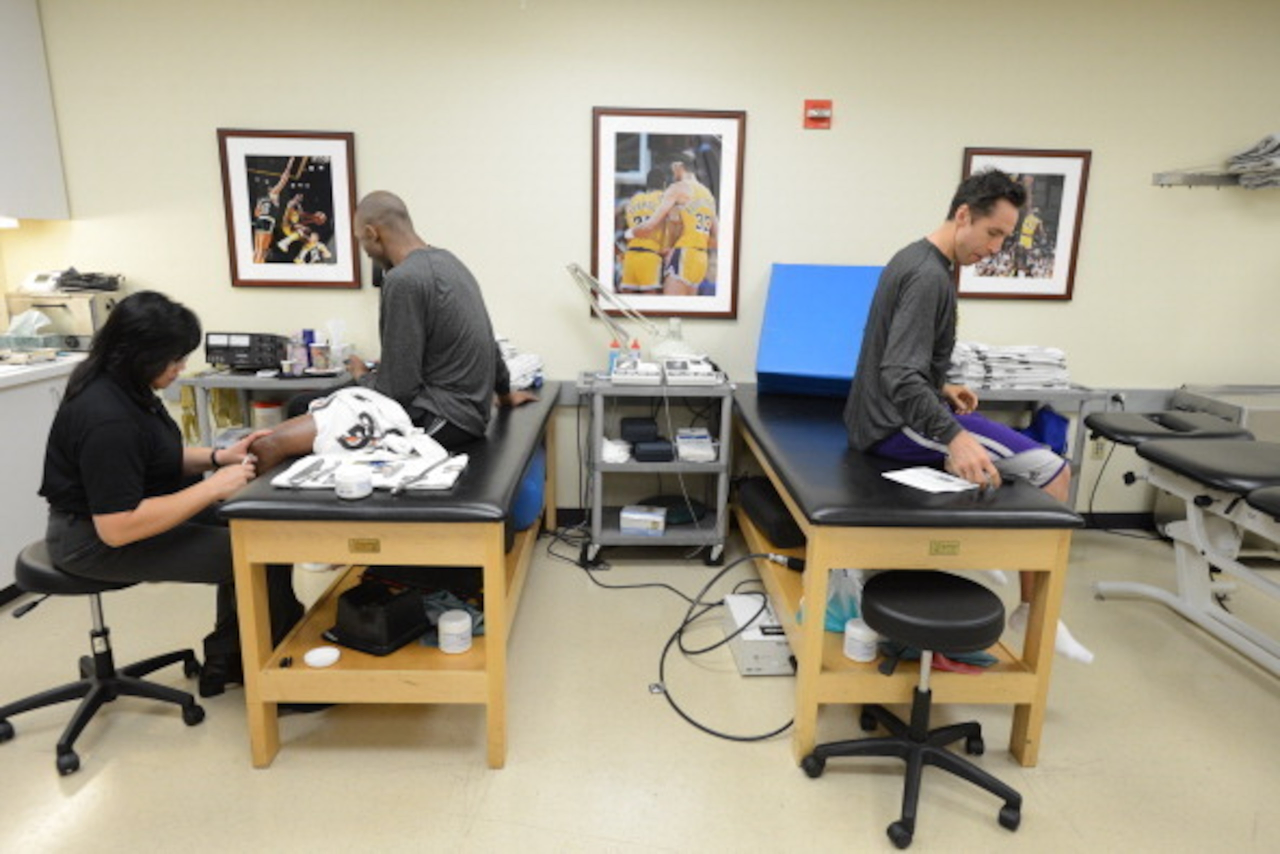 LOS ANGELES, CA - FEBRUARY 28: Kobe Bryant #24 and Steve Nash #10 of the Los Angeles Lakers sit in the training room before facing the Minnesota Timberwolves at Staples Center on February 28, 2013 in Los Angeles, California. NOTE TO USER: User expressly a