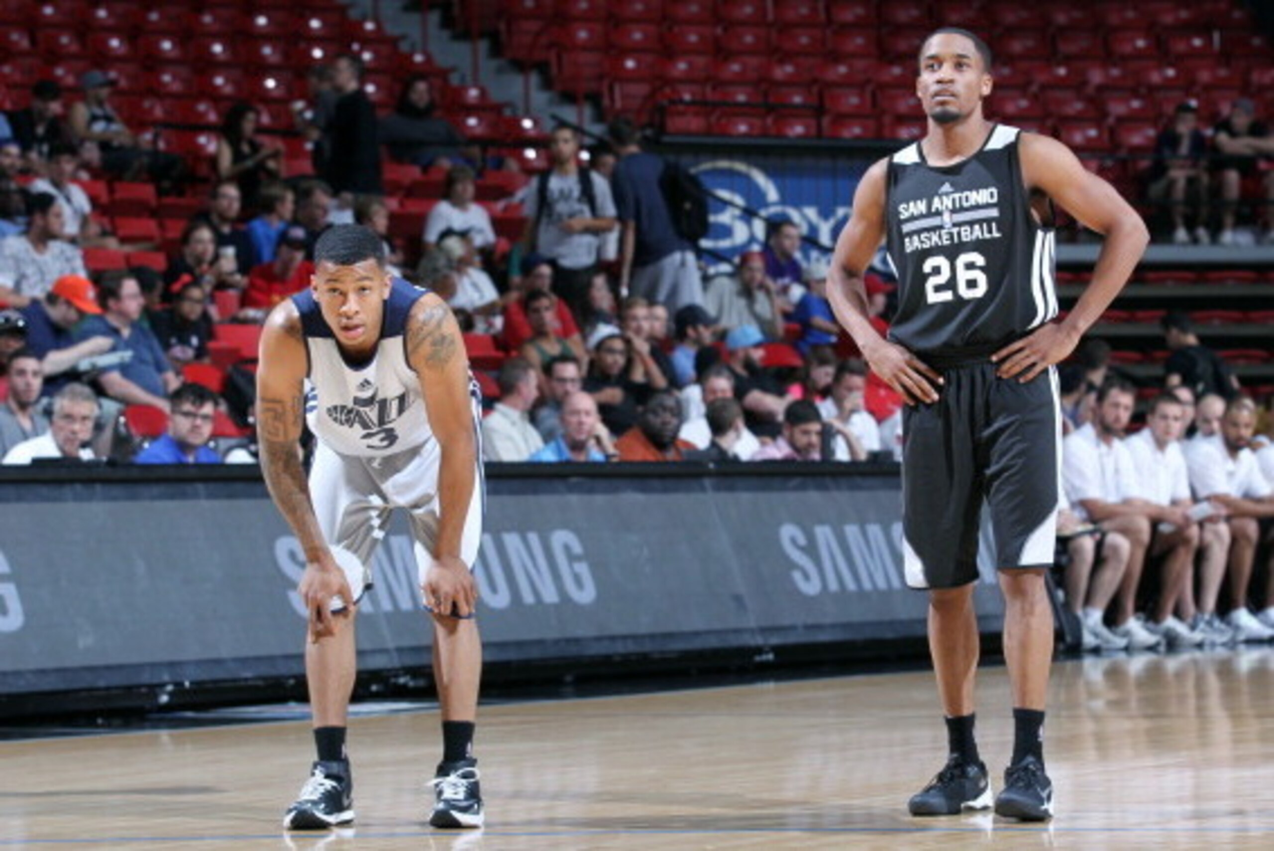 LAS VEGAS, NV - JULY 17: Trey Burke #3 of the Utah Jazz stands on the court during a game against Bryce Cotton #26 of the San Antonio Spurs during the Samsung NBA Summer League 2014 on July 17, 2014 at the Cox Pavilion in Las Vegas, Nevada. NOTE TO USER: 