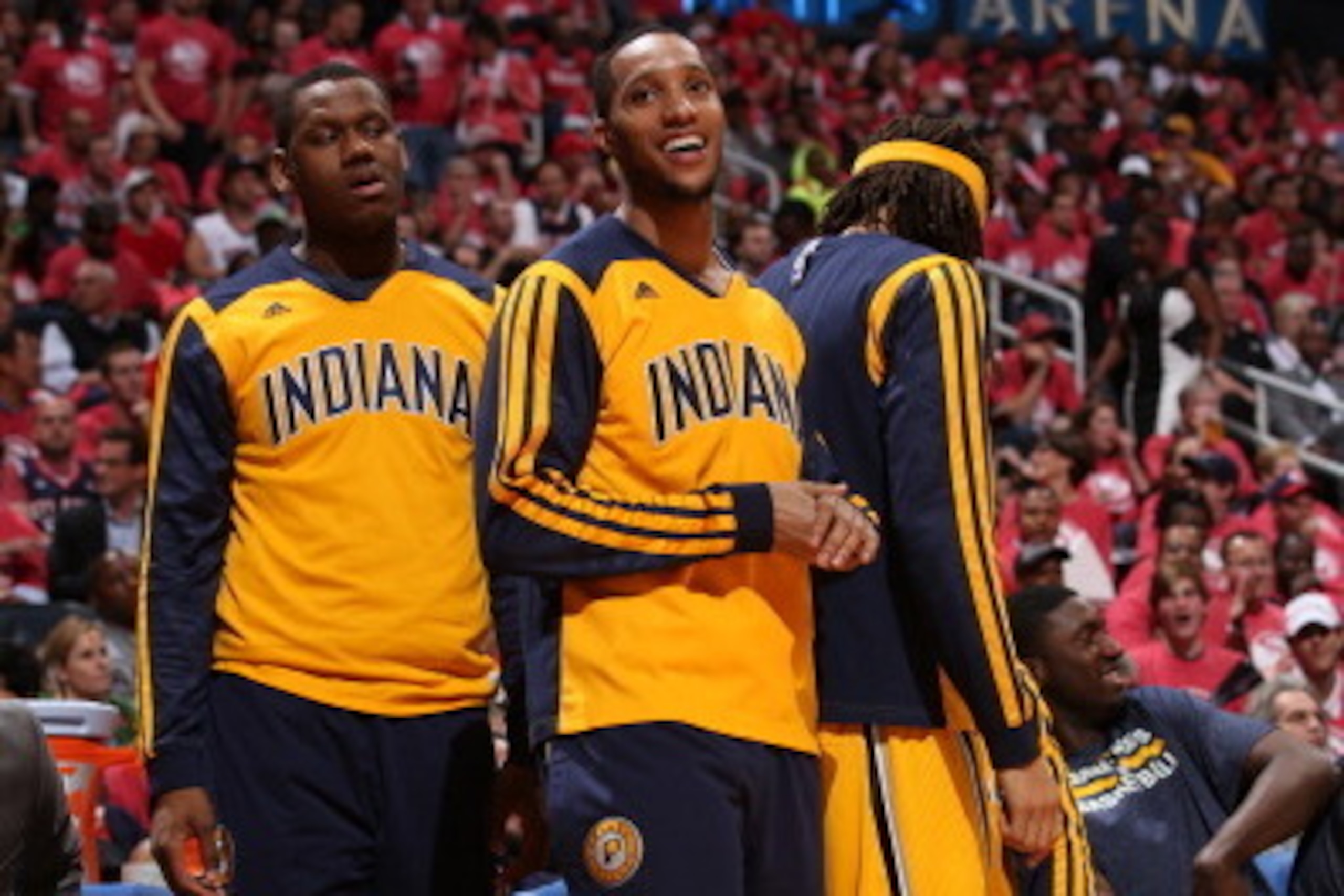 ATLANTA, GA - MAY 1:  Evan Turner #12 of the Indiana Pacers celebrates on the bench against the Atlanta Hawks during Game Six of the Eastern Conference Quarterfinals on May 1, 2014 at Philips Arena in Atlanta, Georgia.  NOTE TO USER: User expressly acknow