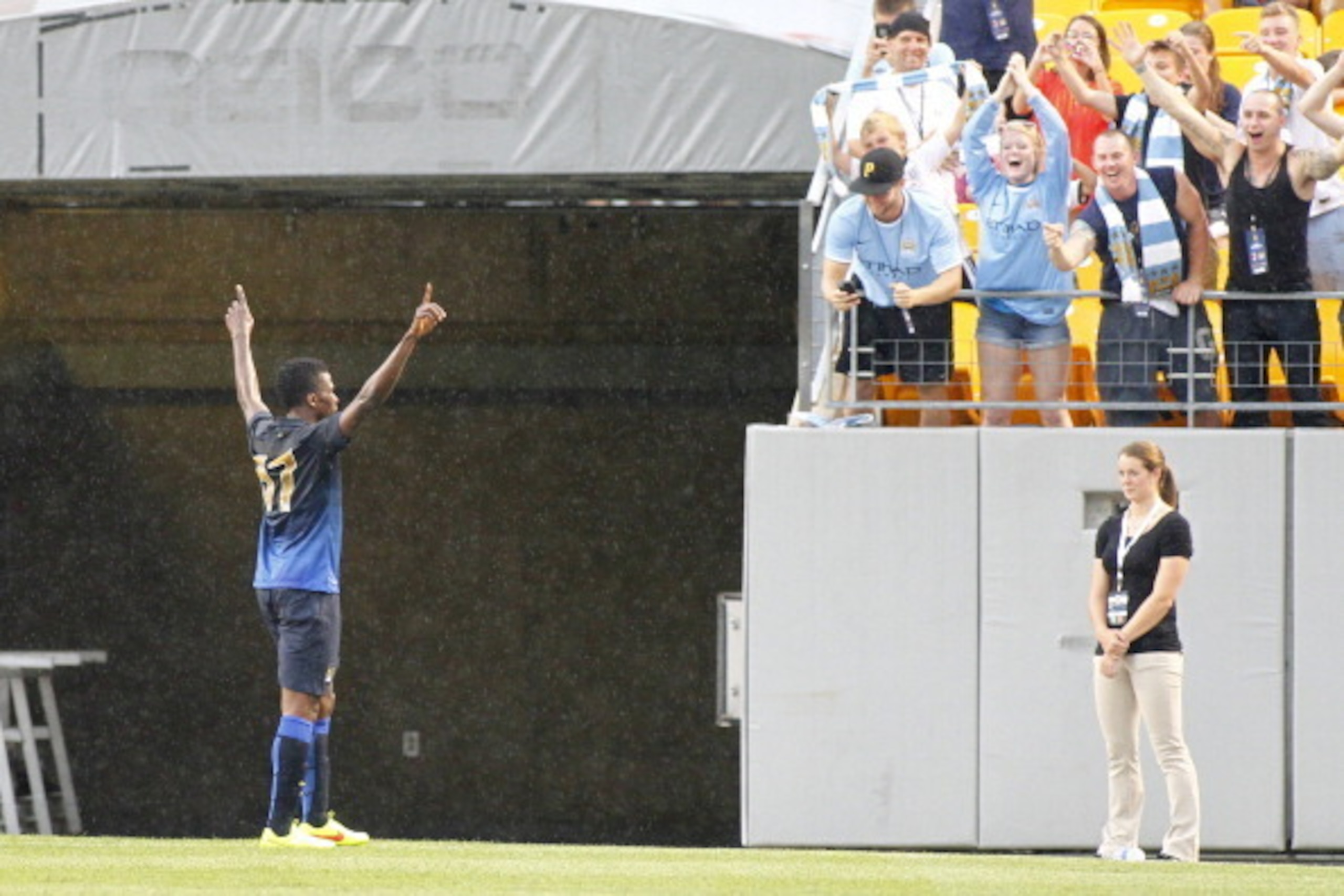 PITTSBURGH, PA - JULY 27:  Kelechi Ihenacho #67 of Manchester City celebrates after scoring in the first half against AC Milan during International Champions Cup 2014 at Heinz Field on July 27, 2014 in Pittsburgh, Pennsylvania.  (Photo by Justin K. Aller/