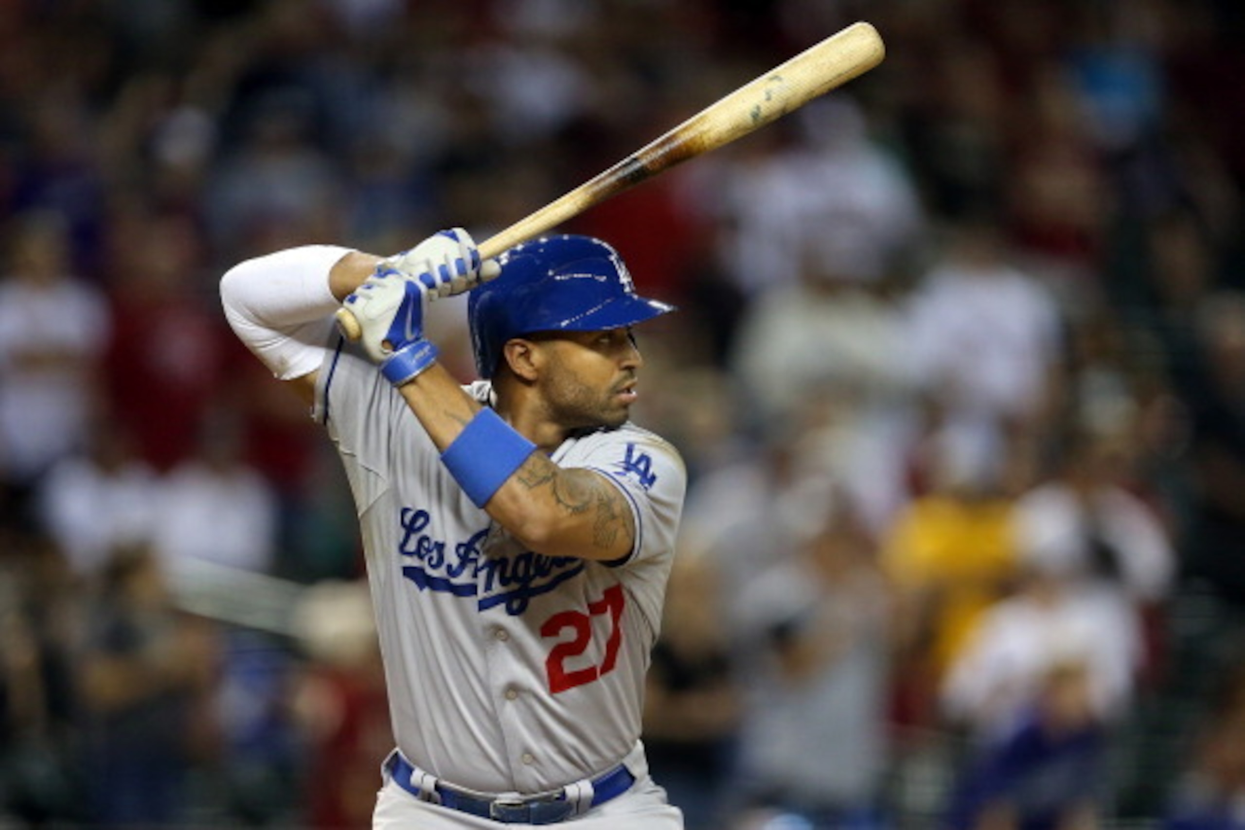 PHOENIX, AZ - MAY 17:  Matt Kemp #27 of the Los Angeles Dodgers bats against the Arizona Diamondbacks during the MLB game at Chase Field on May 17, 2014 in Phoenix, Arizona.   The Diamondbacks defeated the Dodgers 18-7.(Photo by Christian Petersen/Getty I