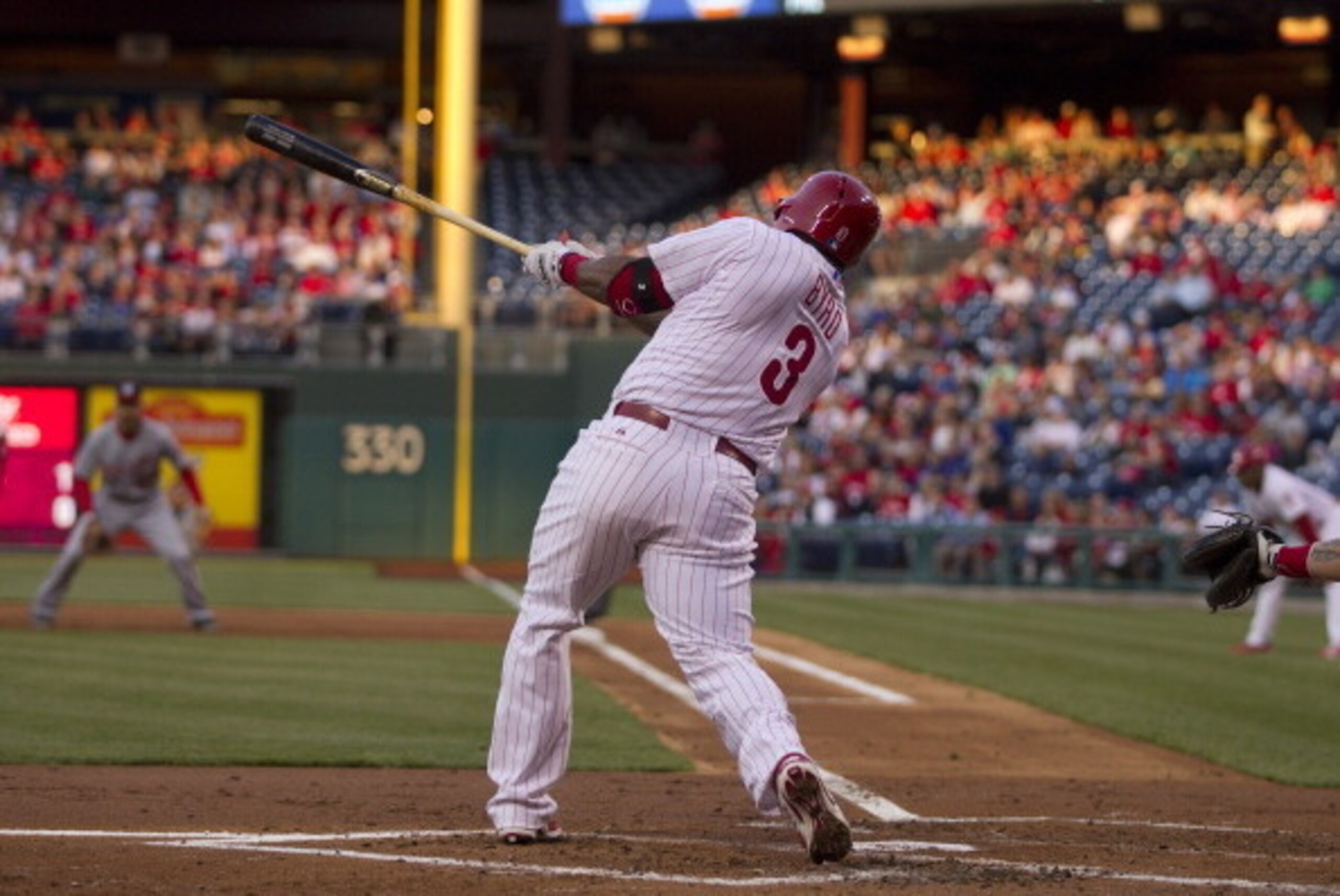PHILADELPHIA, PA - MAY 2: Right fielder Marlon Byrd #3 of the Philadelphia Phillies hits a three run home run in the first inning against the Washington Nationals on May 2, 2014 at Citizens Bank Park in Philadelphia, Pennsylvania. (Photo by Mitchell Leff/